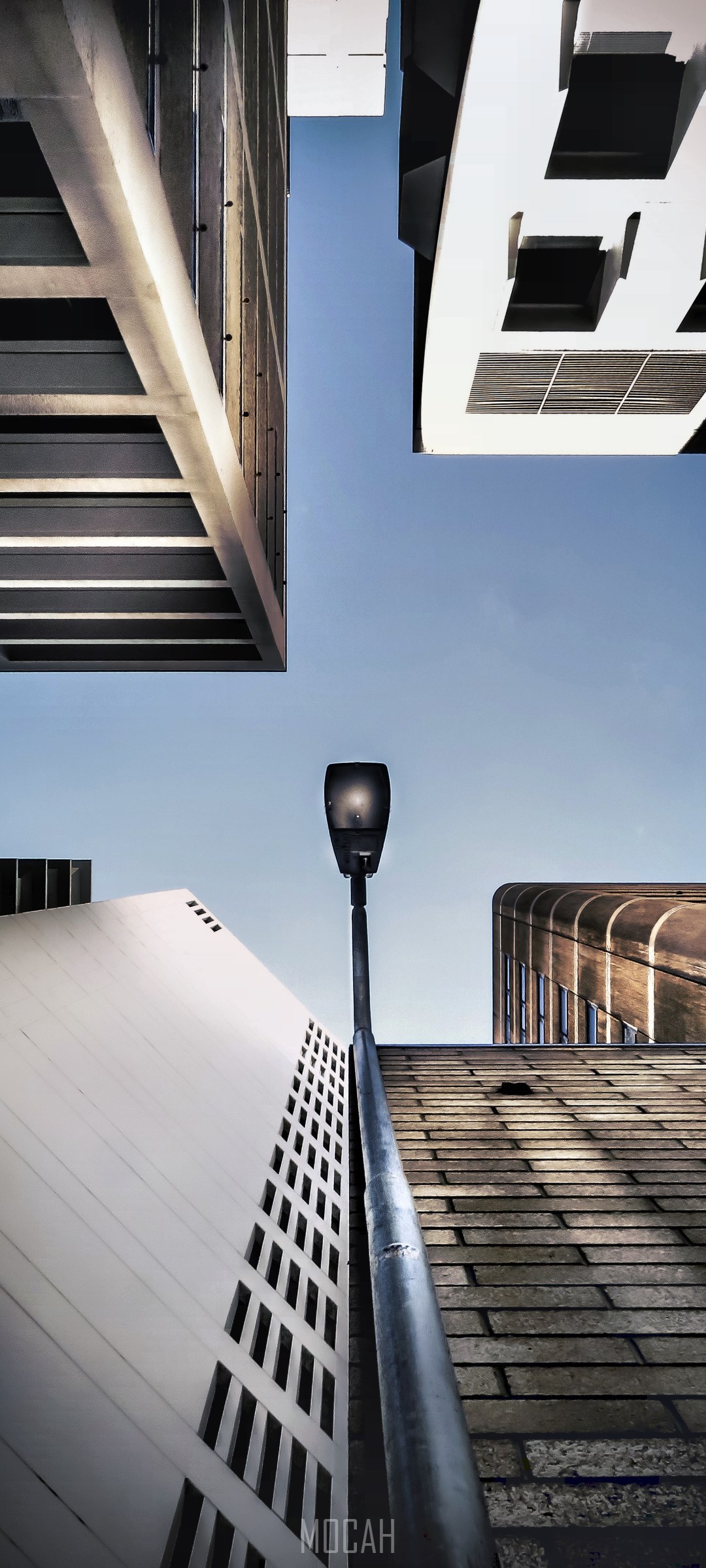 Low angle shot of a lamppost and modern buildings HD Phone Wallpaper