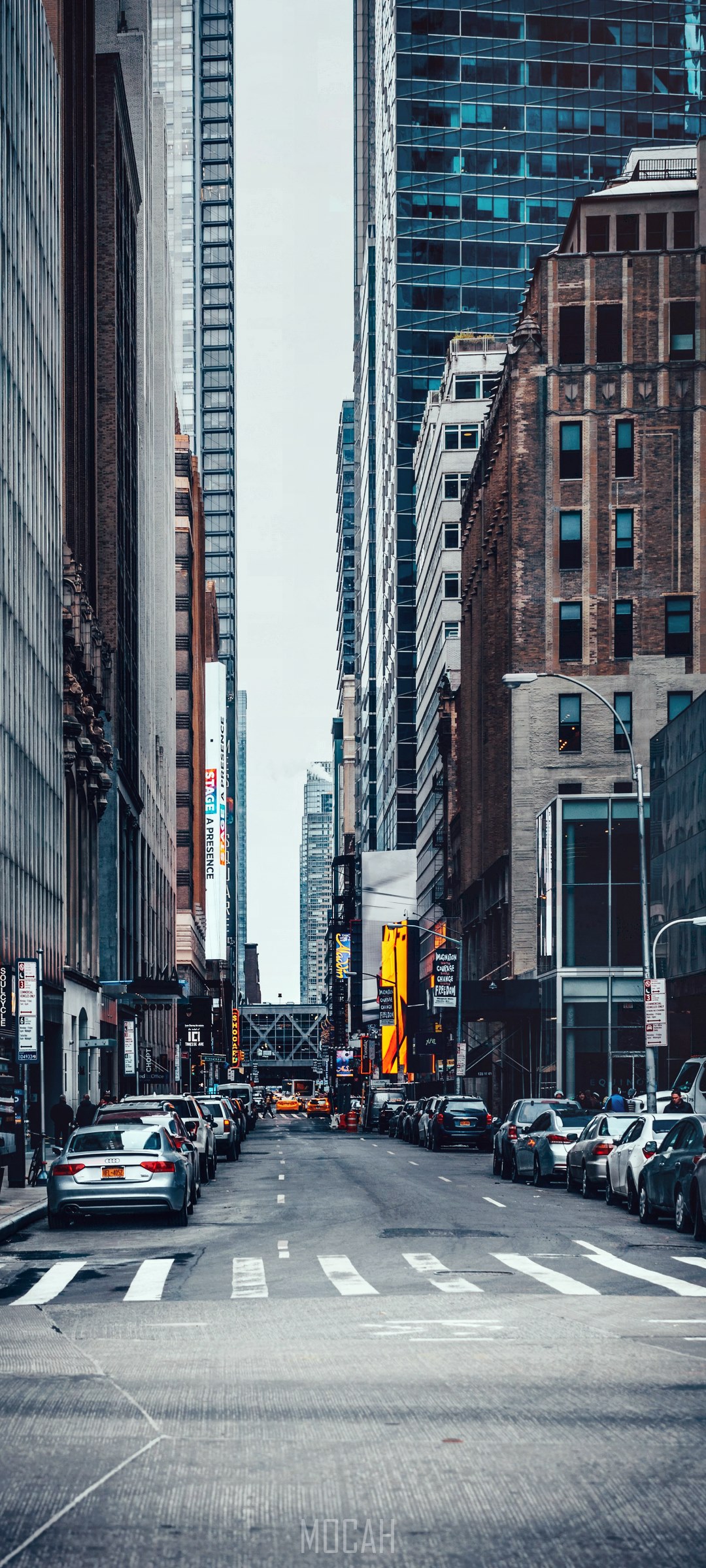 New York City street with tall buildings and cars HD Phone Wallpaper