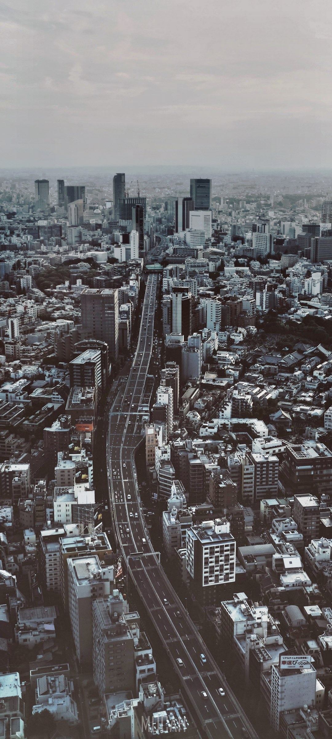 Aerial view of Tokyo cityscape with elevated highway HD Phone Wallpaper