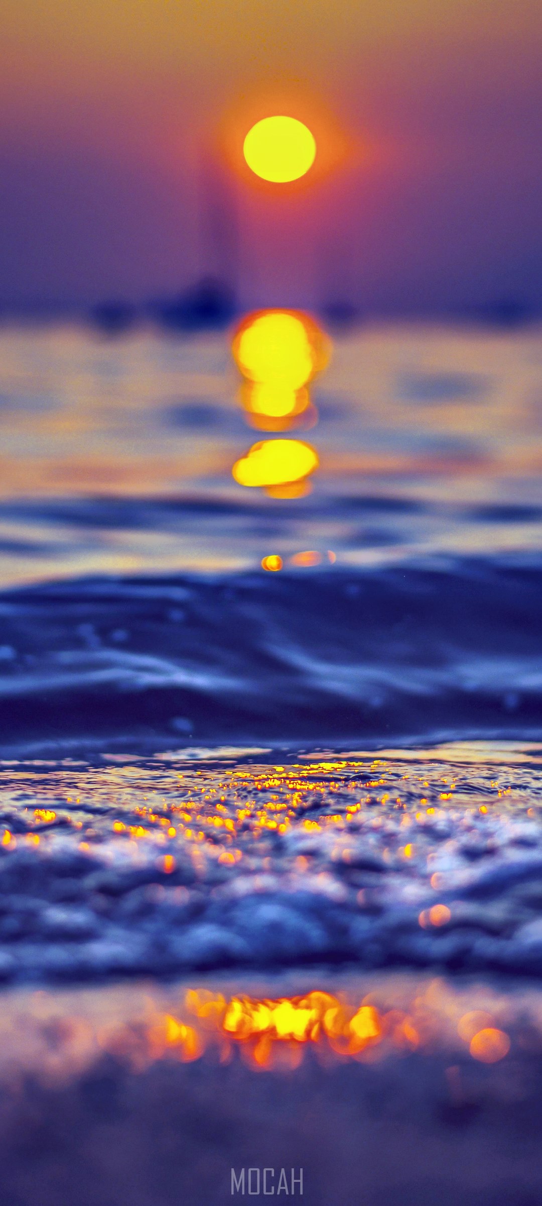 Sunset over the ocean with reflection HD Phone Wallpaper