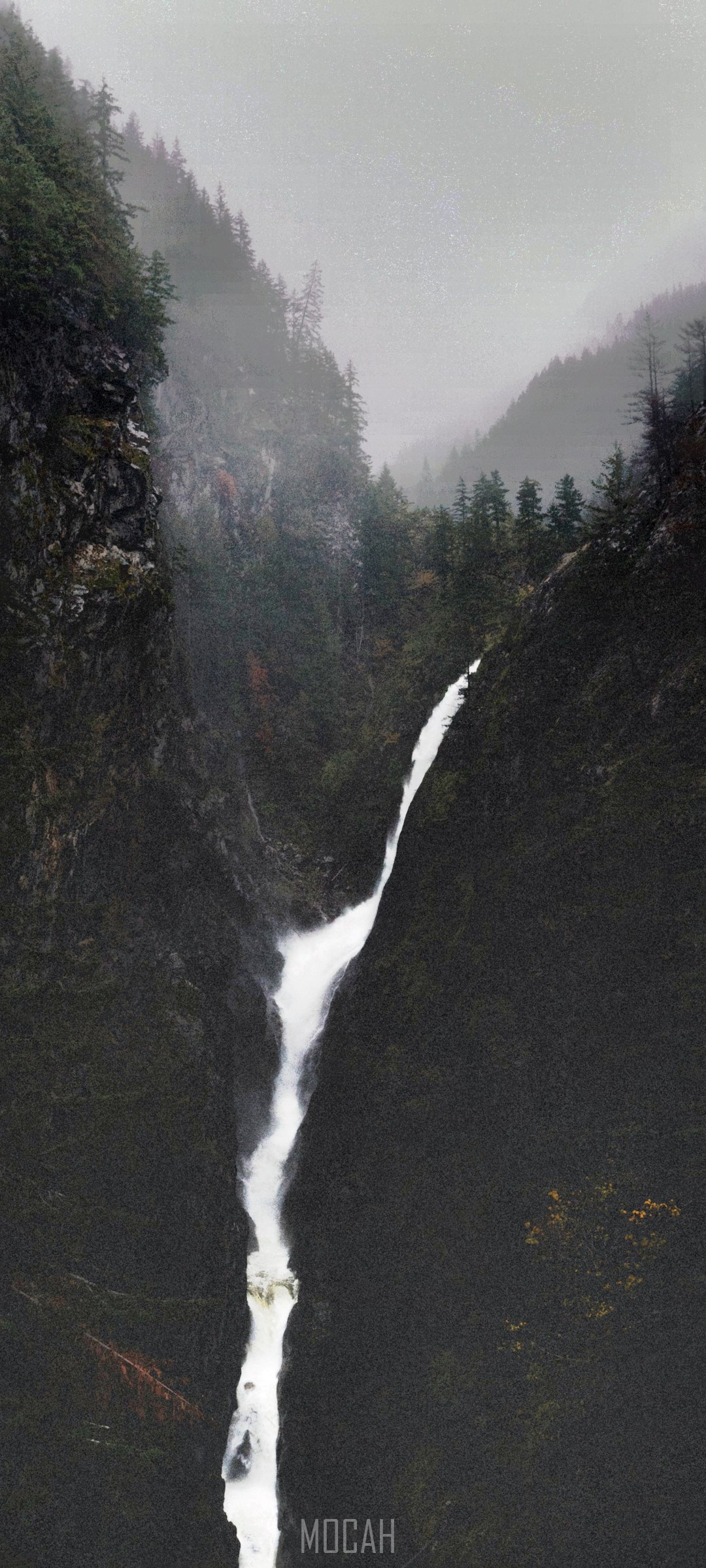 Waterfall in a misty mountain forest HD Phone Wallpaper