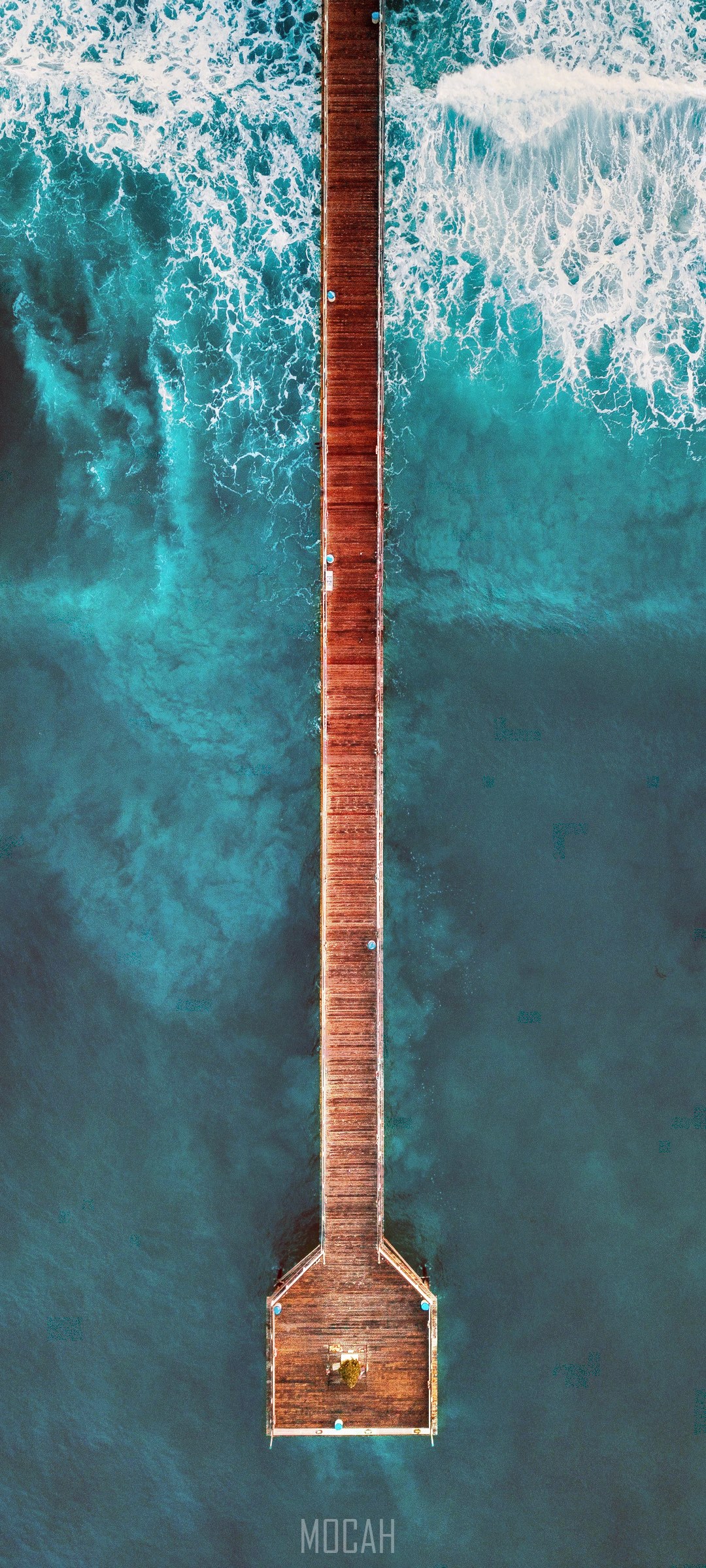 Wooden pier over turquoise ocean waves HD Phone Wallpaper