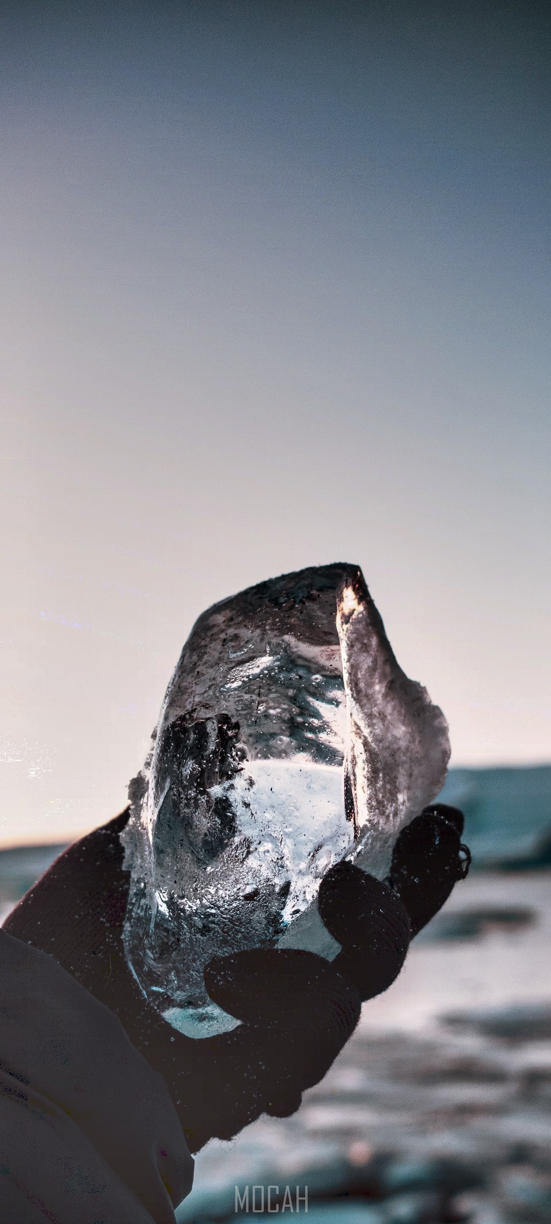 Hand holding ice in Iceland HD Phone Wallpaper