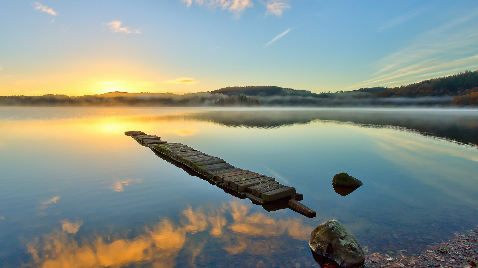 Sunrise over misty lake with stone jetty HD Wallpaper