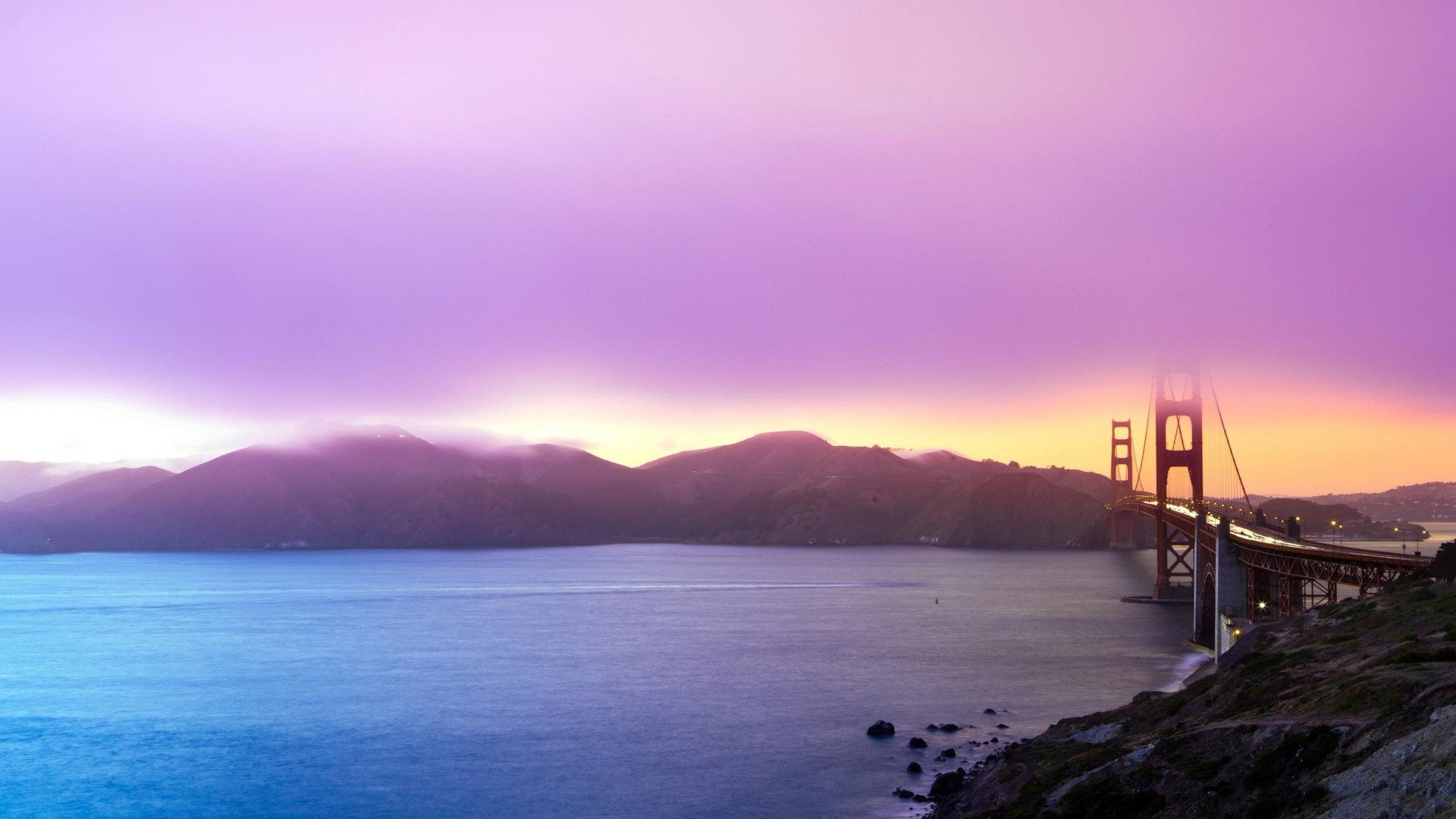 Golden Gate Bridge at sunset with purple sky HD Wallpaper