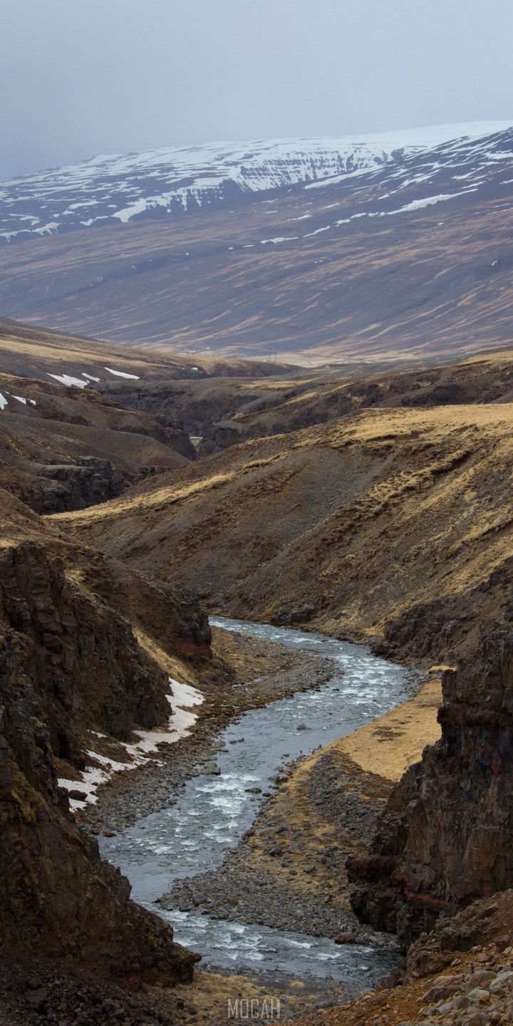 #274354 river flowing through a rocky valley with the mountains in the ...