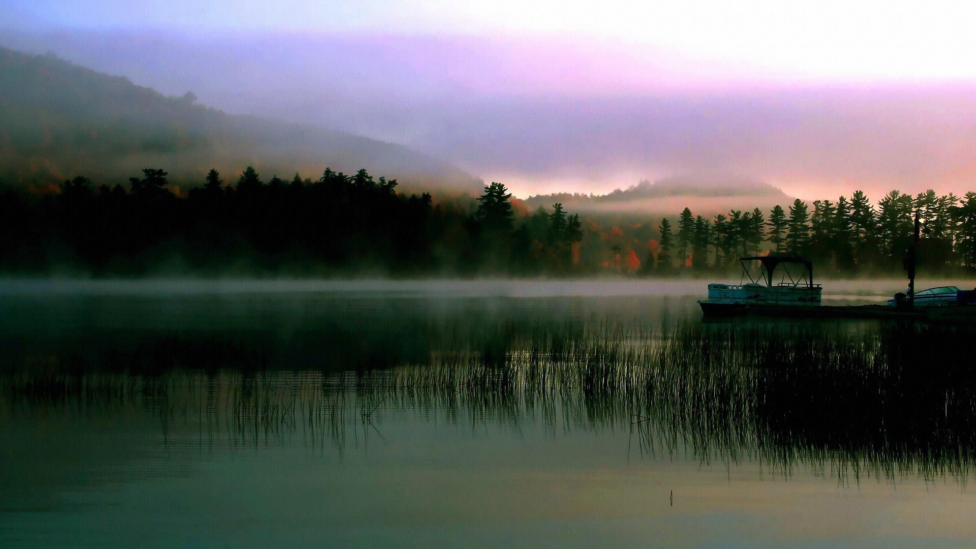 Misty lake at sunrise with a boat docked HD Wallpaper