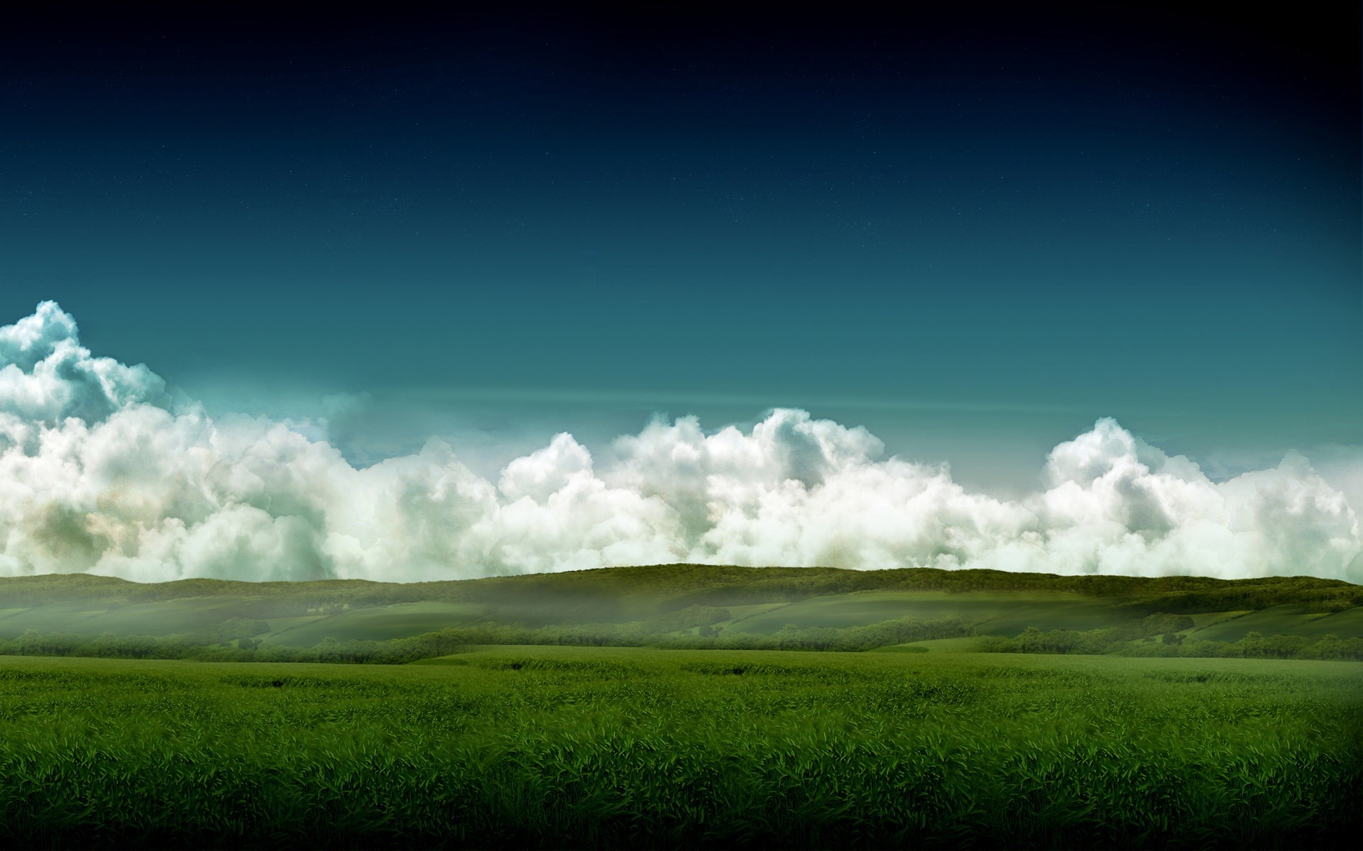 Green fields and rolling hills under a cloudy sky HD Wallpaper
