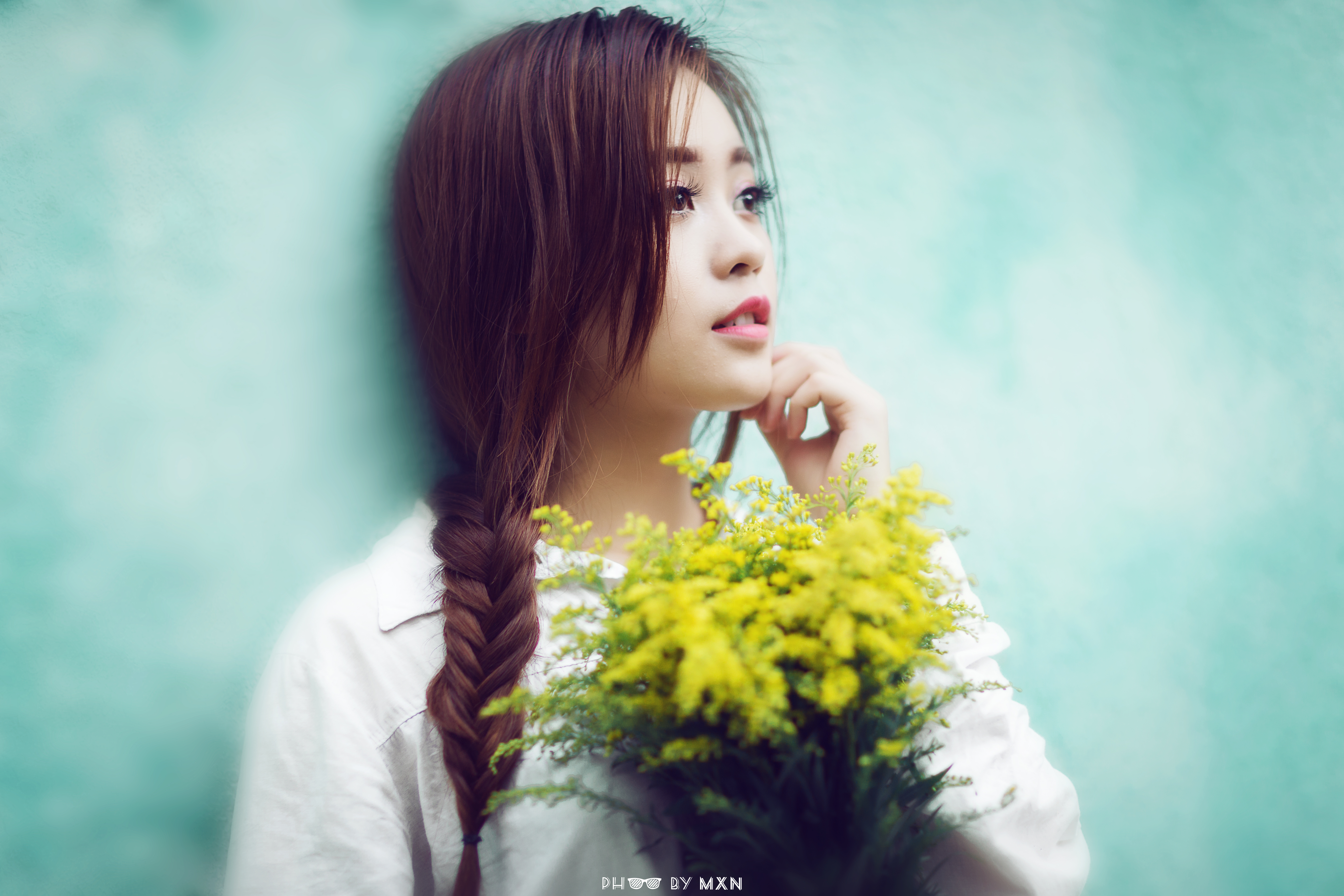 Young Asian woman with braided hair holding flowers HD Wallpaper
