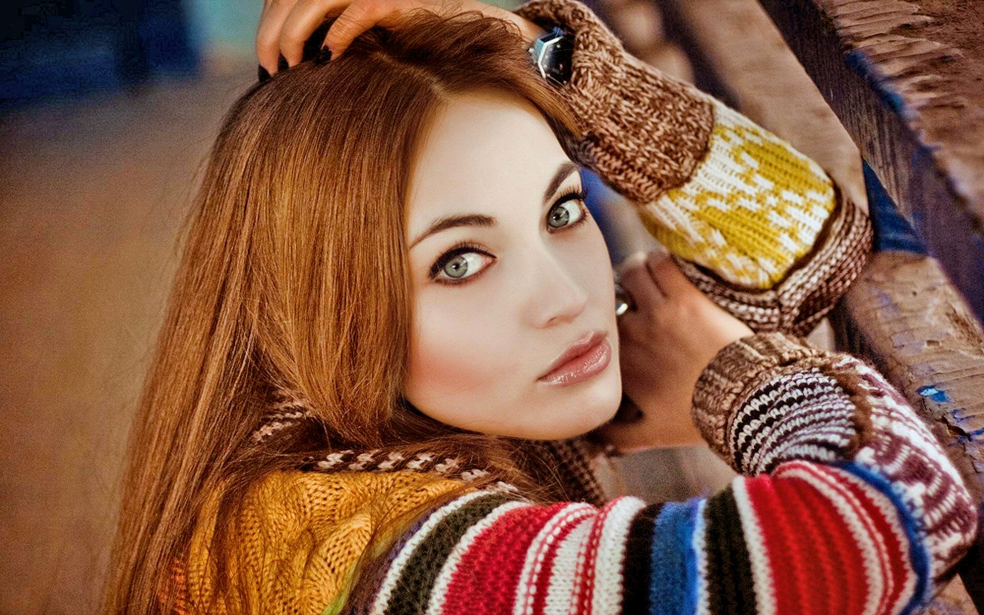 Woman with red hair wearing a colorful sweater HD Wallpaper