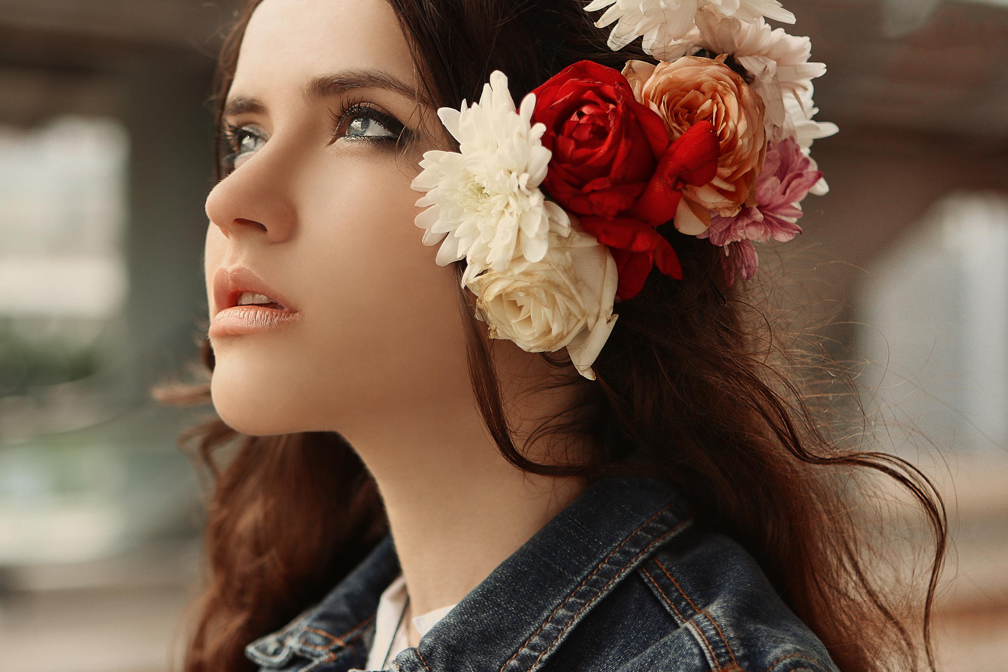 Woman with flowers in her hair and denim jacket HD Wallpaper