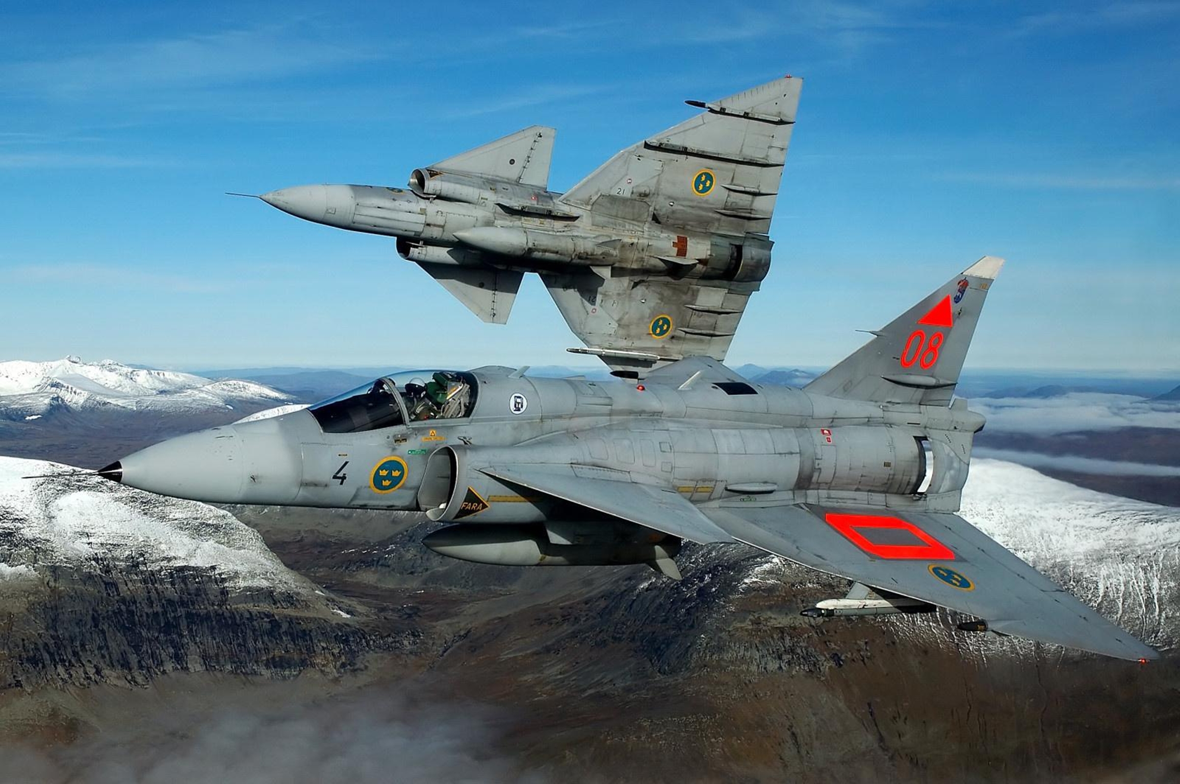 Two Swedish Saab 35 Draken fighter jets in flight HD Wallpaper