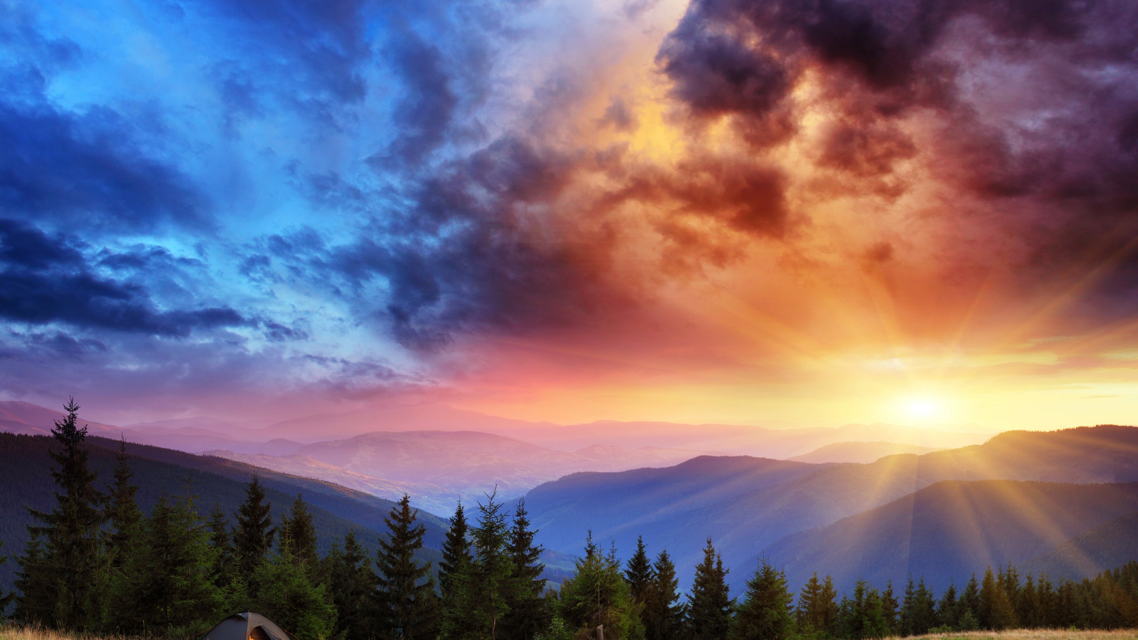 Sunrise over mountains with dramatic clouds HD Wallpaper