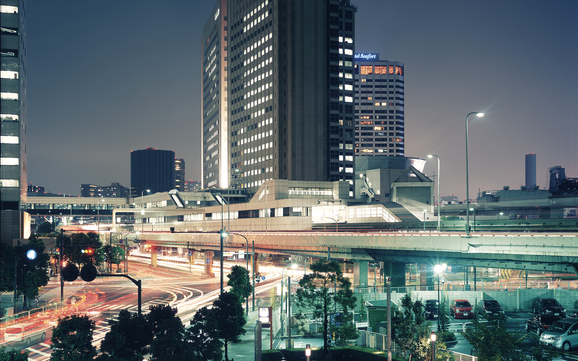 Cityscape at Night with Traffic Trails HD Wallpaper