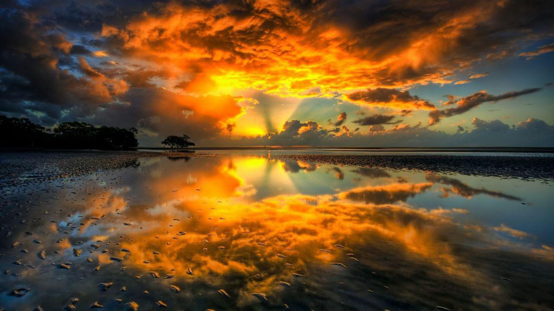 Sunset reflection on wet sand with clouds HD Wallpaper