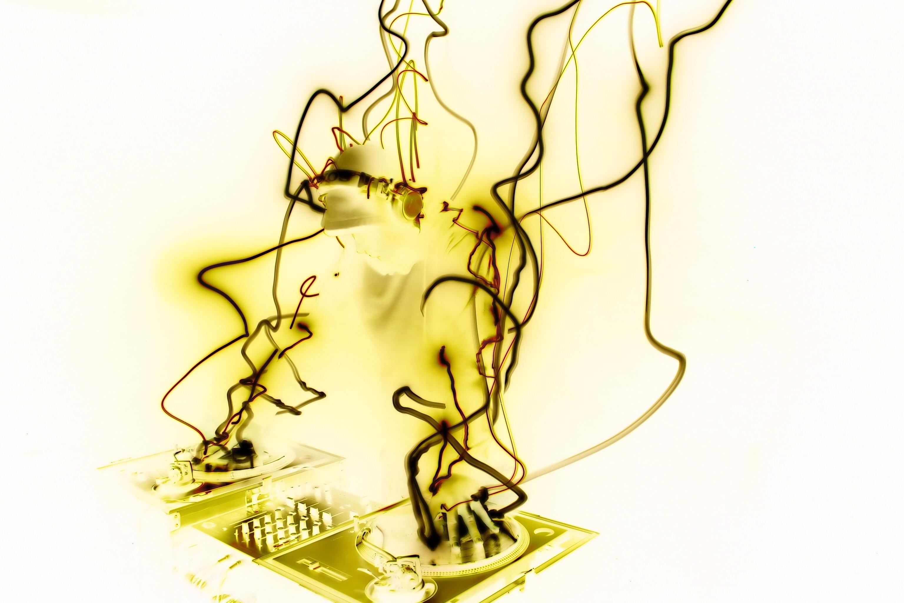 DJ performing with light trails HD Wallpaper