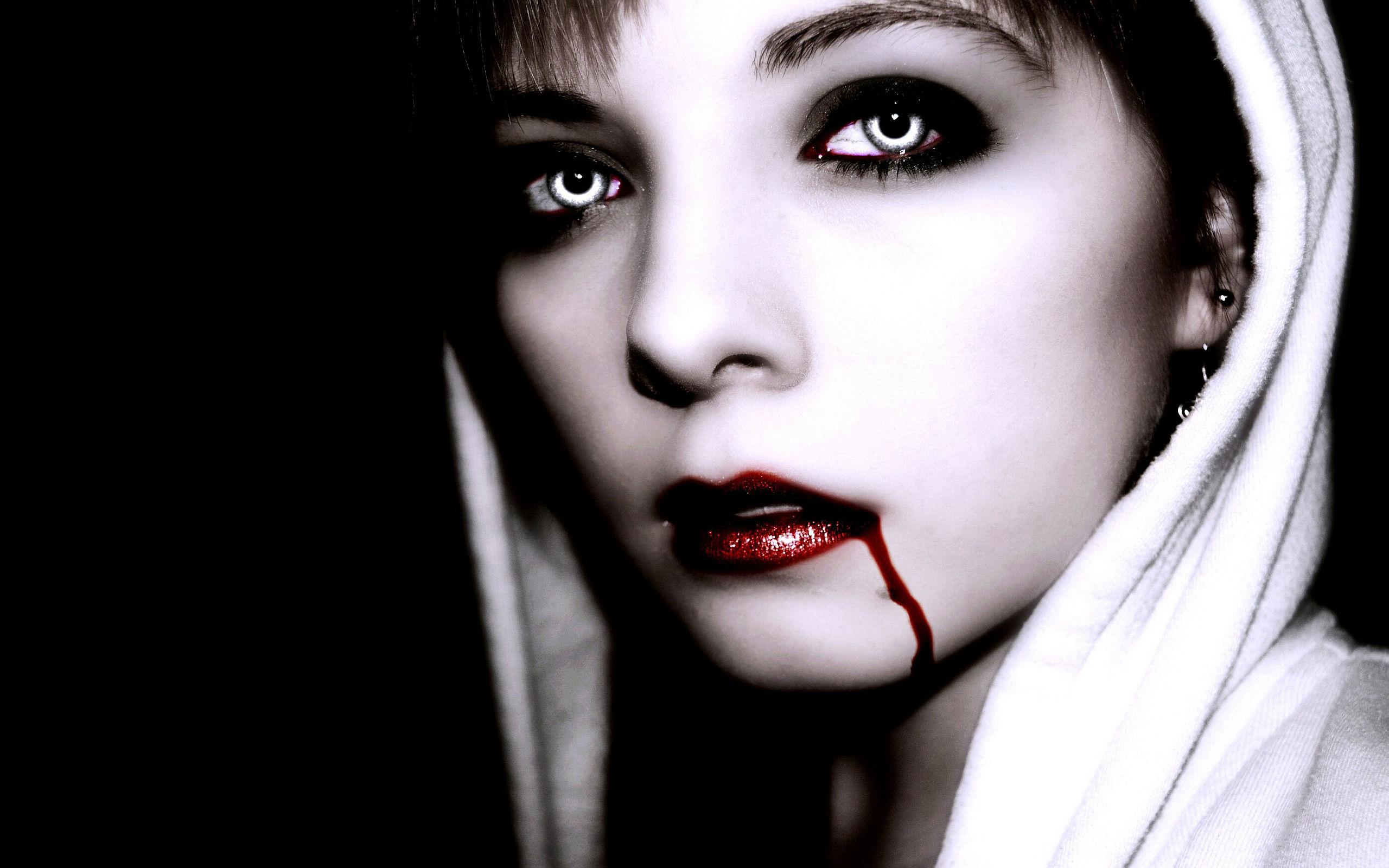Woman with white eyes and blood dripping from lips HD Wallpaper