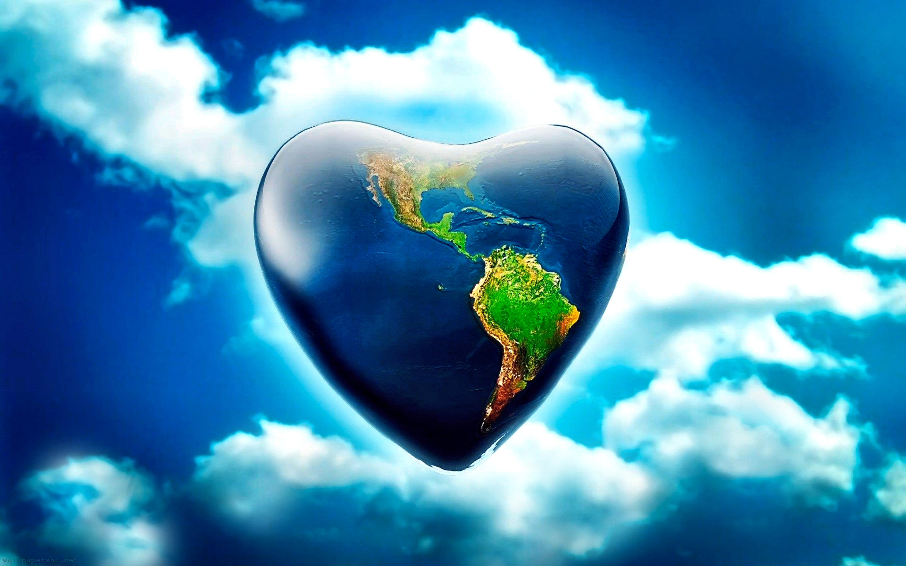 Heart-shaped Earth in the clouds HD Wallpaper