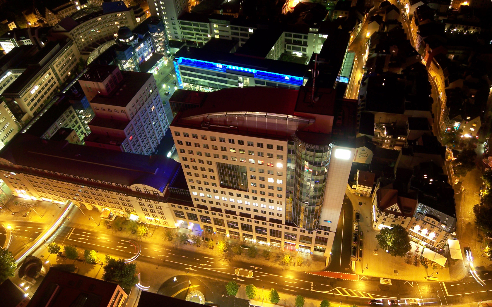 Aerial view of a city at night HD Wallpaper