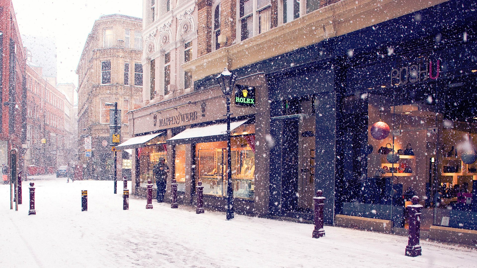 Snowing in London on a Street with Shops HD Wallpaper