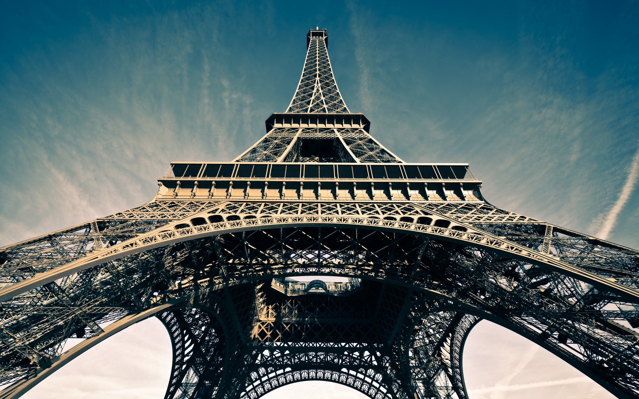 Eiffel Tower against a blue sky HD Wallpaper