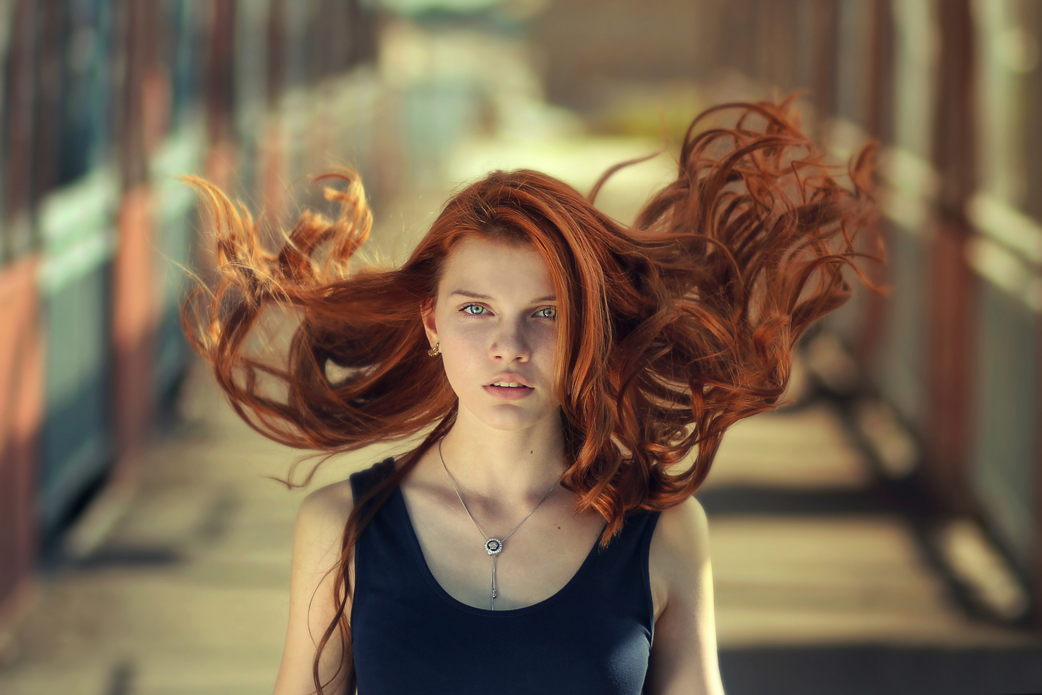 Redhead woman with flowing hair and green eyes HD Wallpaper