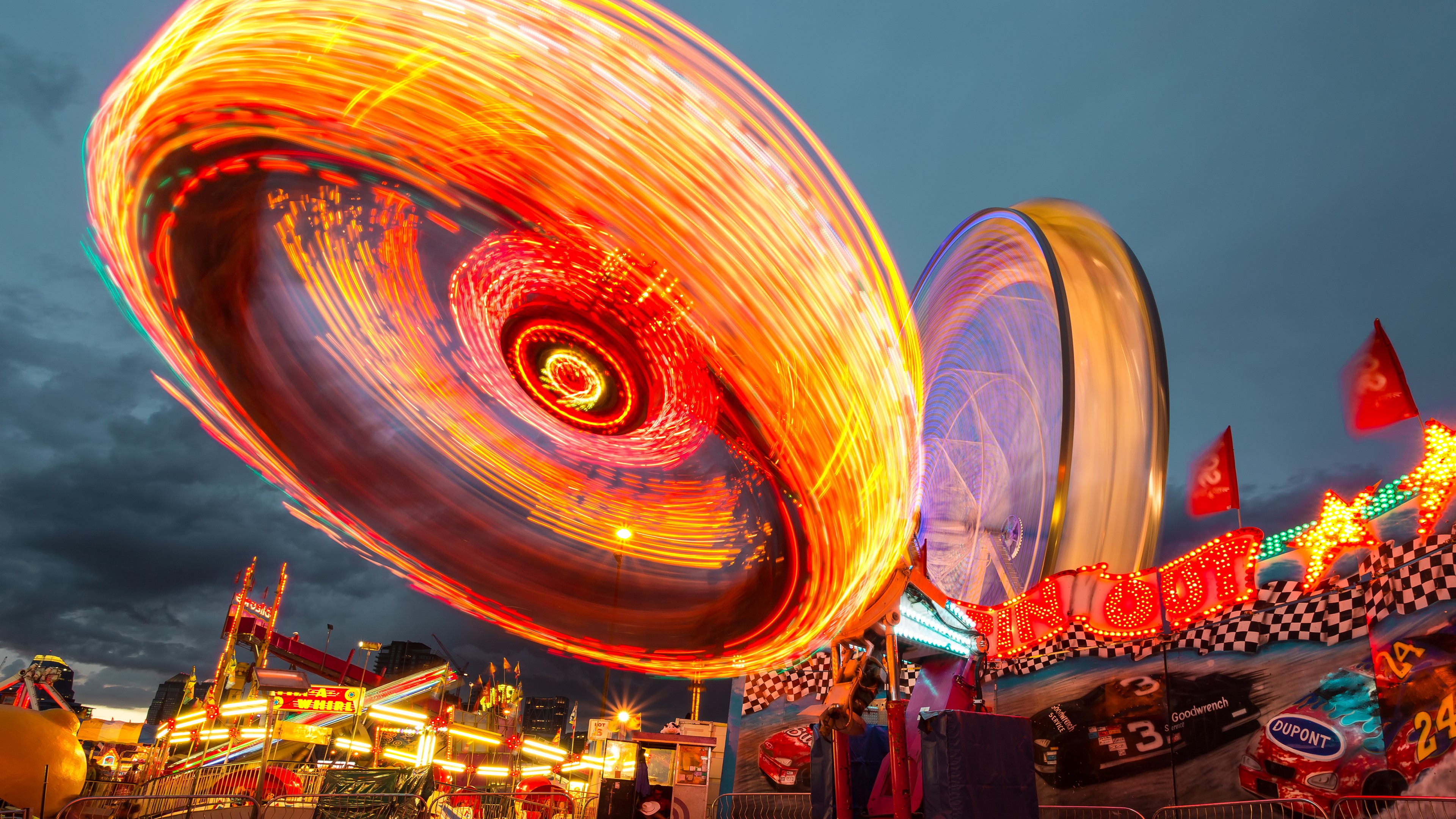 Amusement Park Rides at Night with Light Trails HD Wallpaper