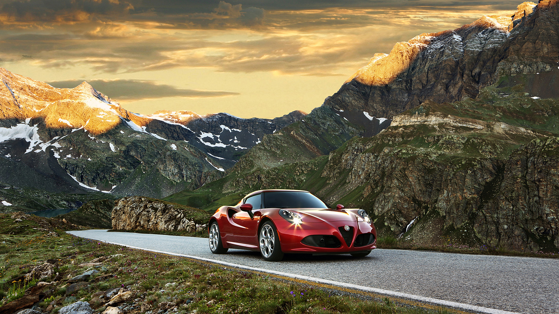 Red Alfa Romeo 4C driving on mountain road HD Wallpaper