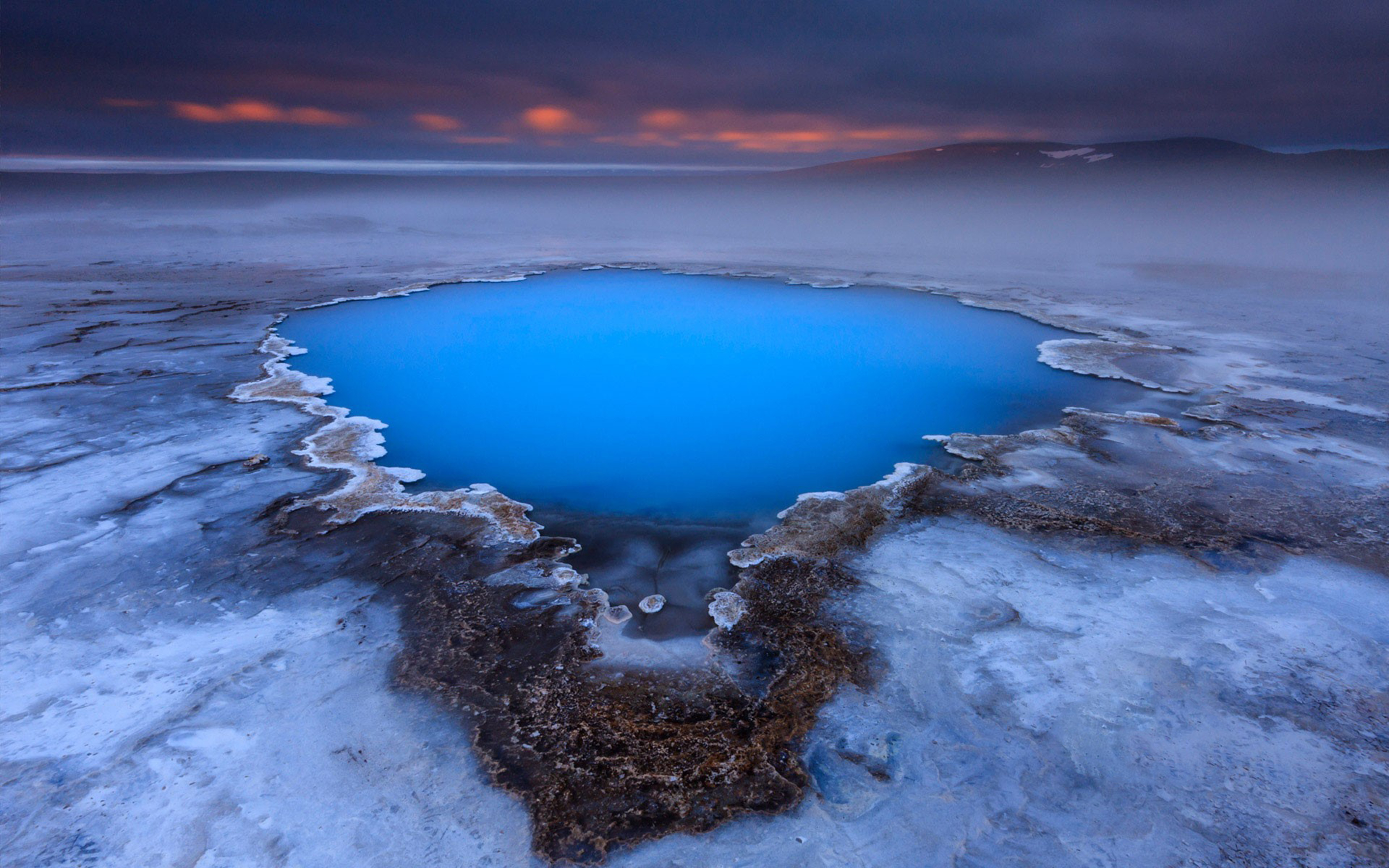 Blue geothermal pool in Iceland with mist HD Wallpaper