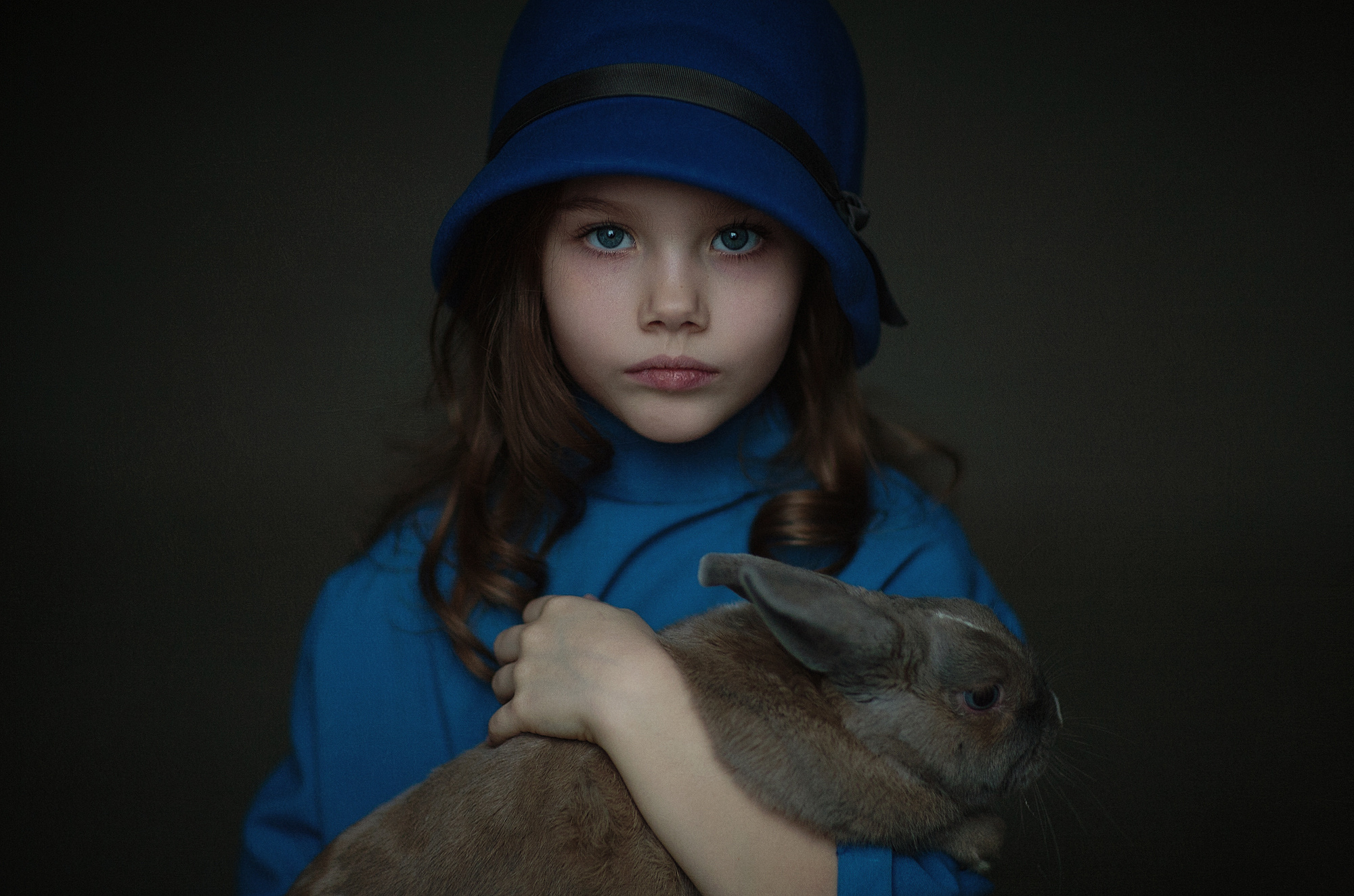 Girl in blue hat holding a rabbit HD Wallpaper