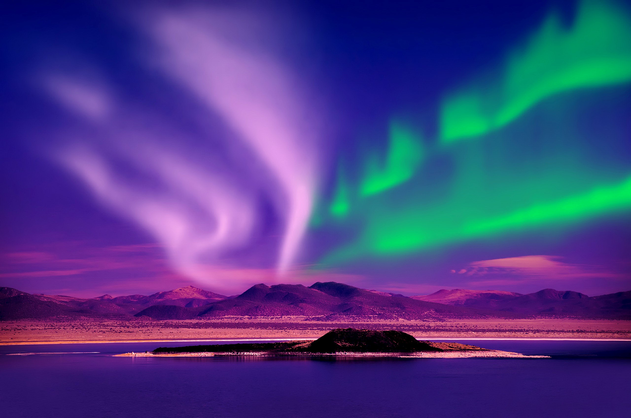 Aurora Borealis over a lake and mountains HD Wallpaper