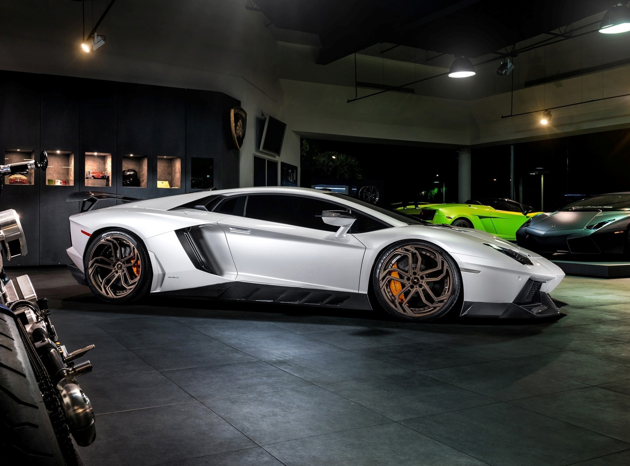 White Lamborghini Aventador in a showroom HD Wallpaper