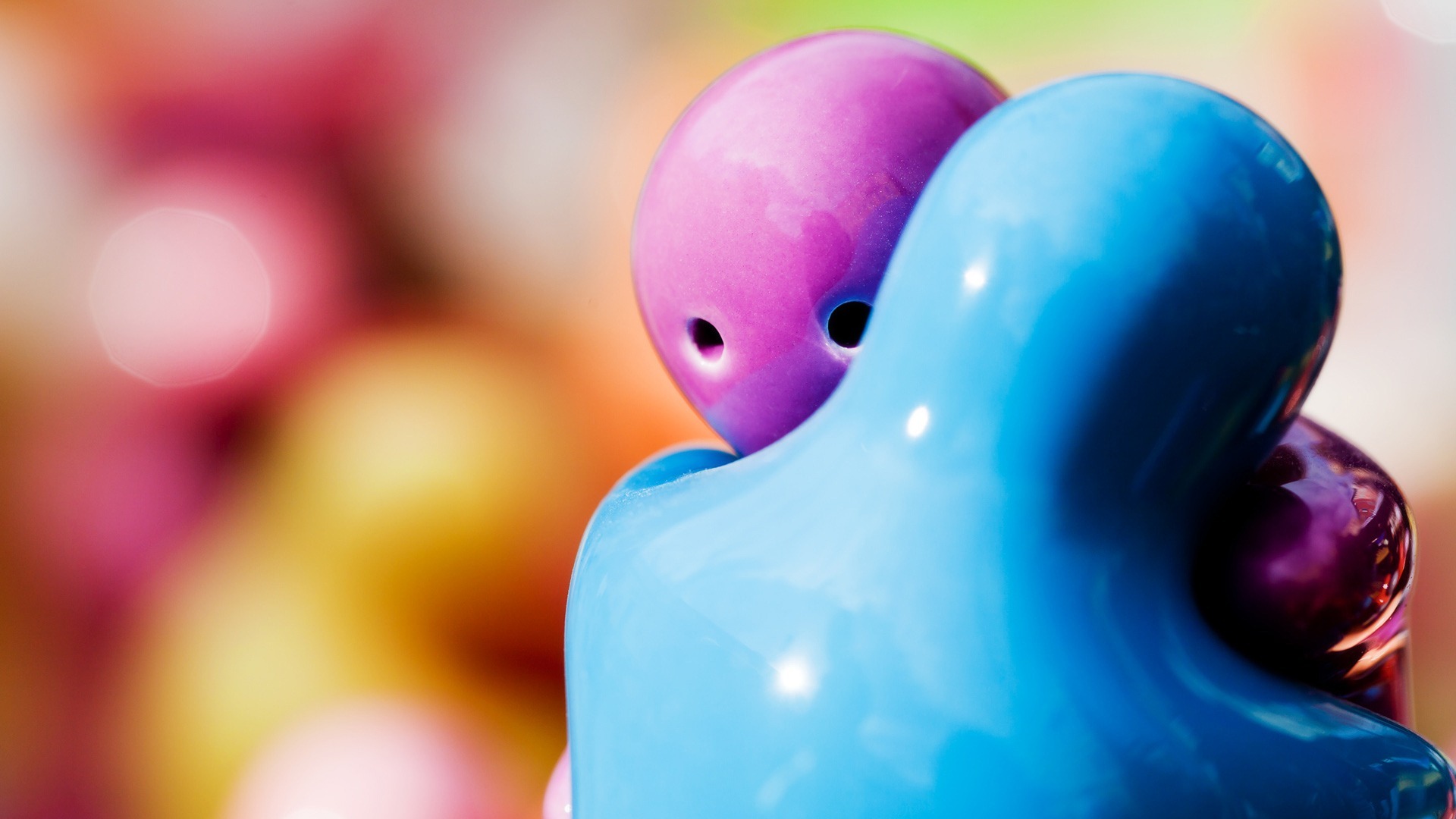 Blue and pink figures hugging HD Wallpaper