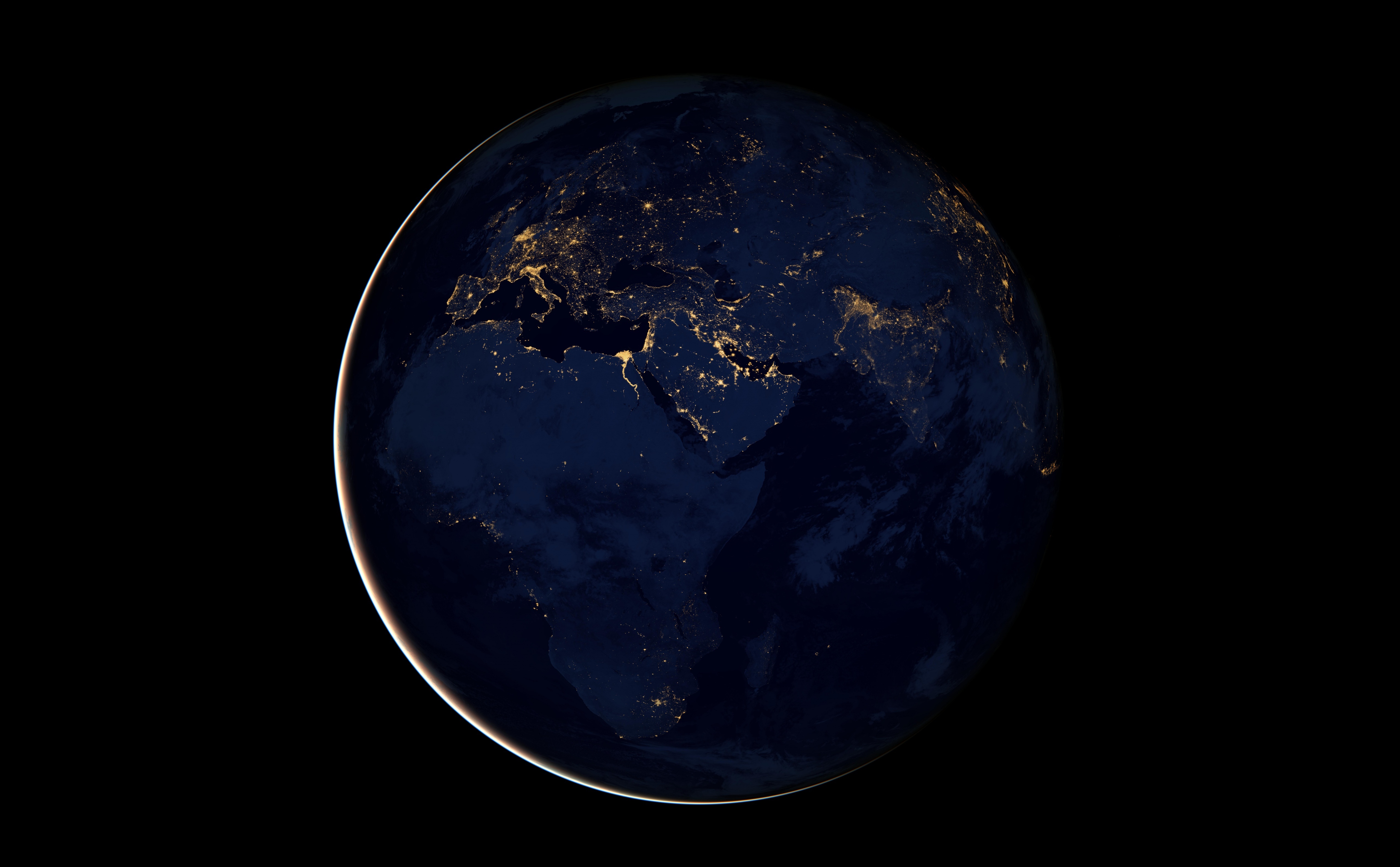 Earth at night showing Europe, Africa, and the Middle East HD Wallpaper