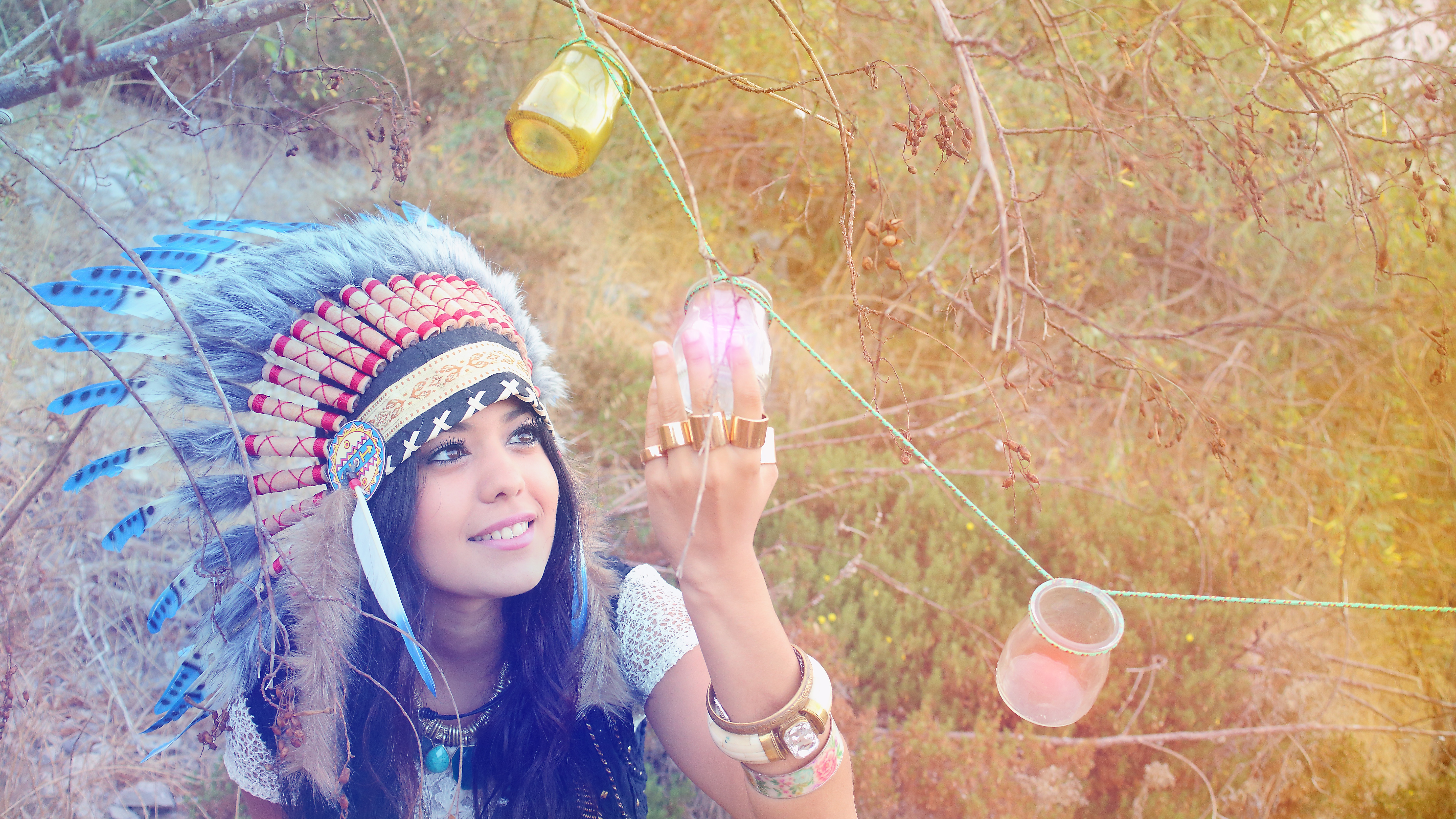 Woman in Native American Headdress with Jars HD Wallpaper