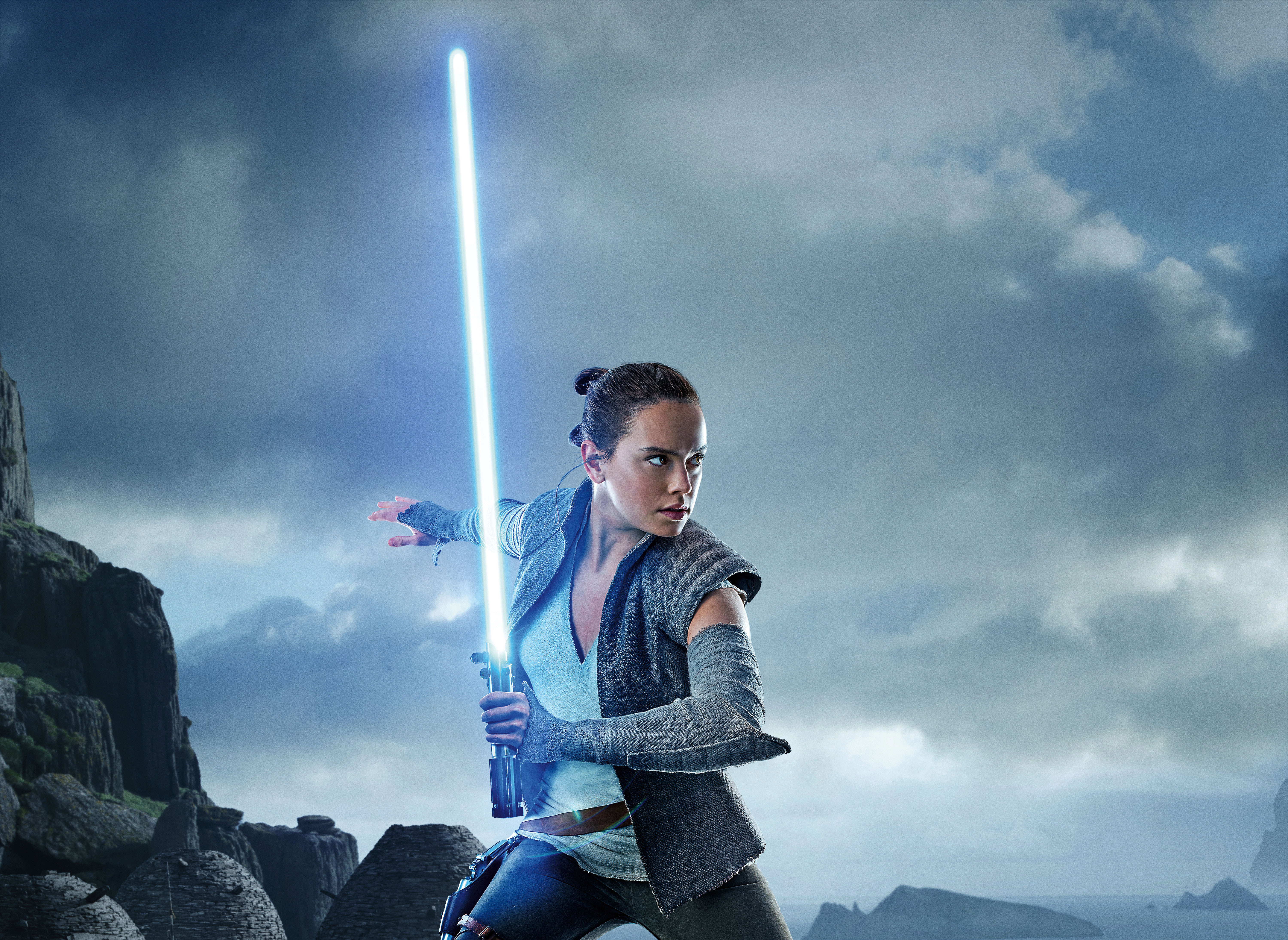 Rey from Star Wars with a blue lightsaber HD Wallpaper