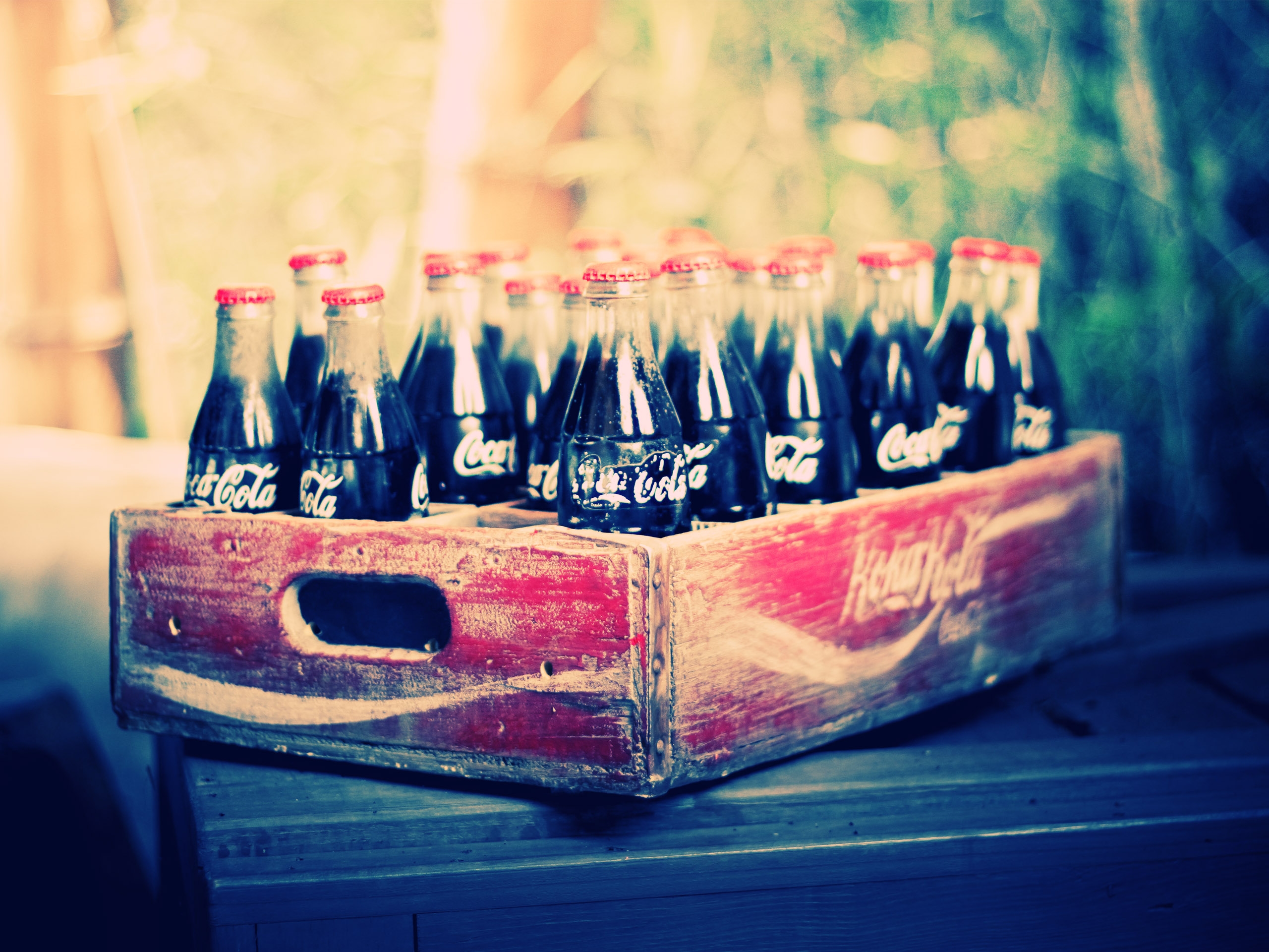 Coca-Cola bottles in a wooden crate HD Wallpaper