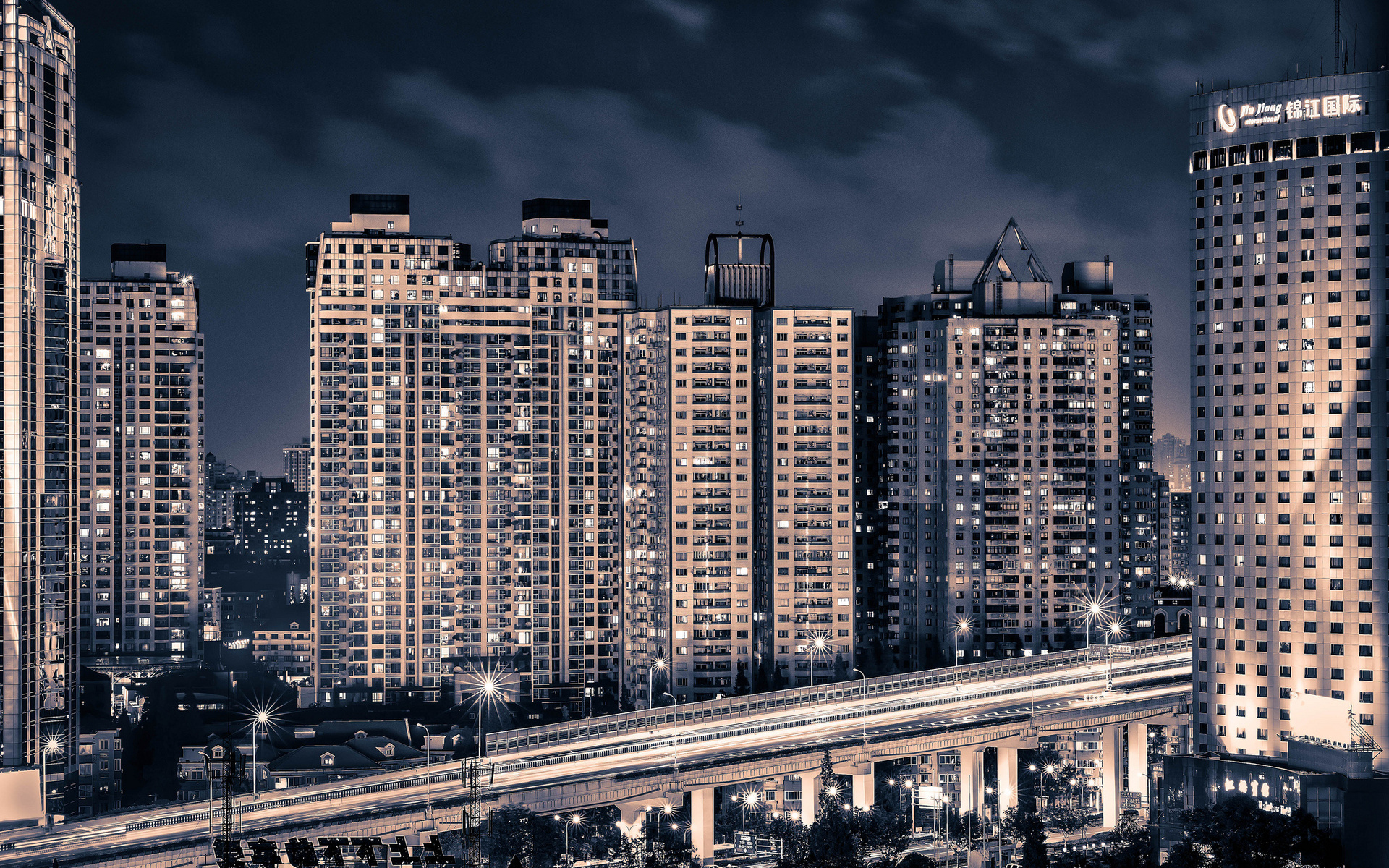 Night view of Shanghai skyscrapers and elevated highway HD Wallpaper