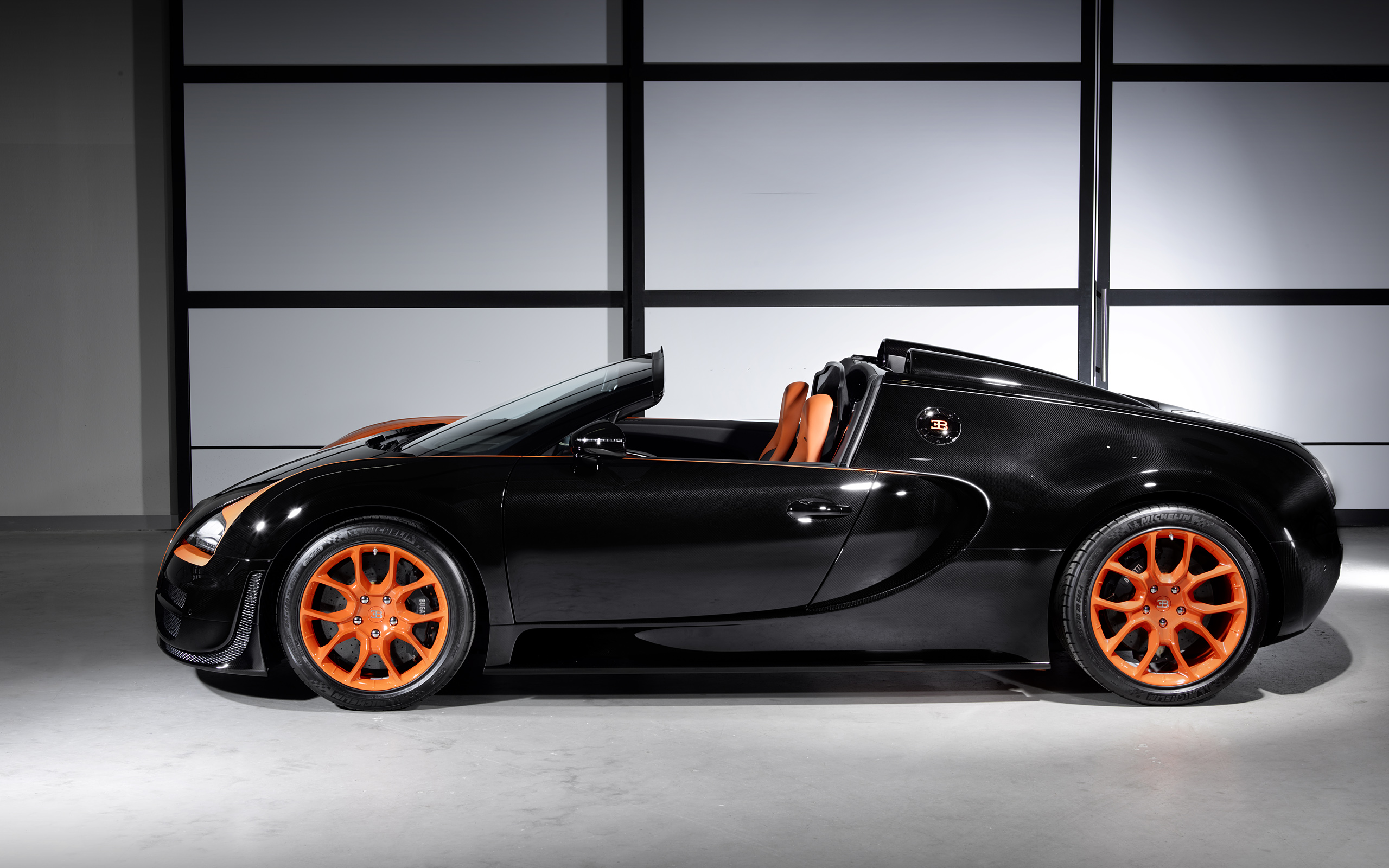 Black Bugatti Veyron Grand Sport with Orange Accents HD Wallpaper