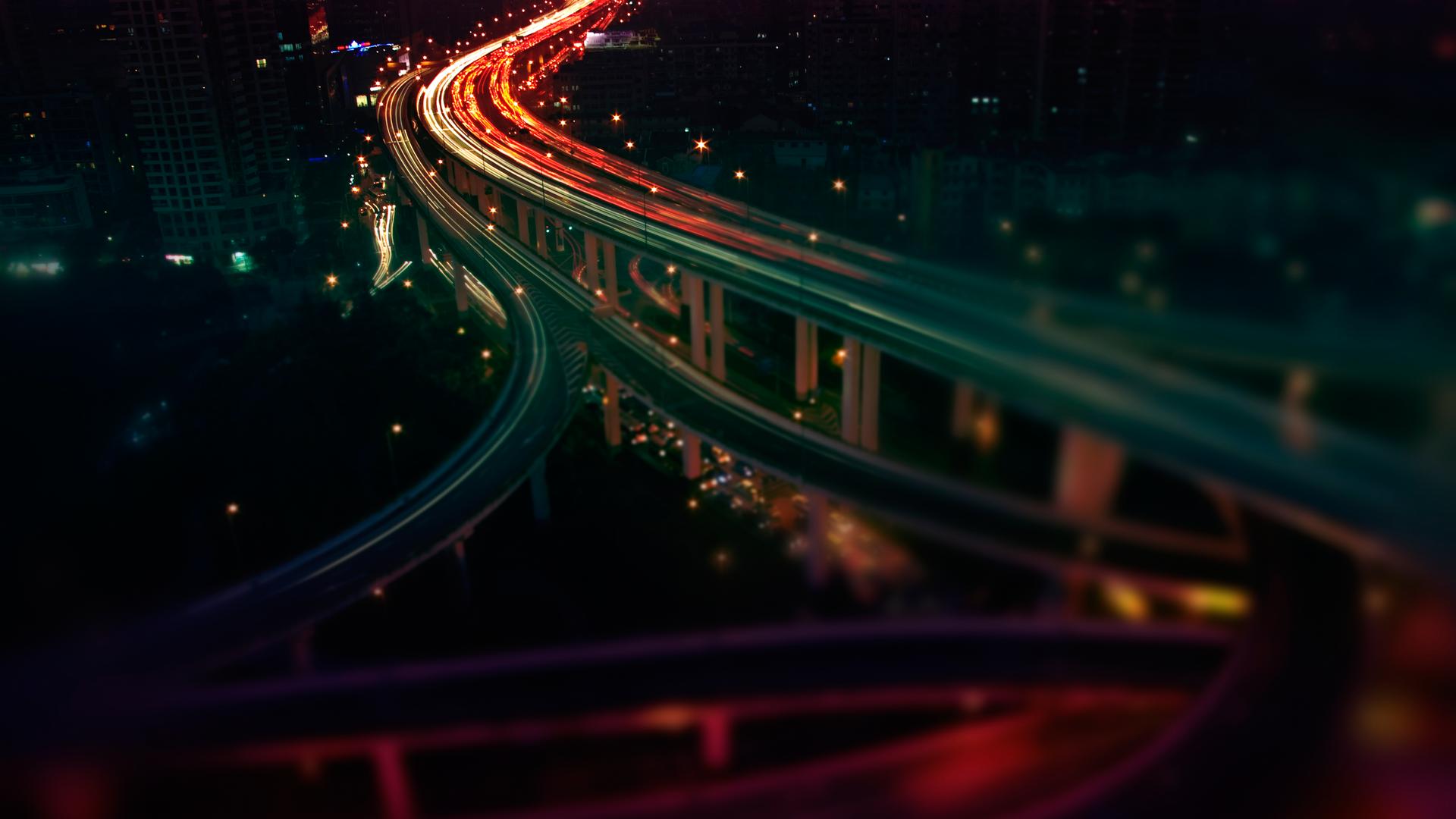 Cityscape at Night with Light Trails HD Wallpaper