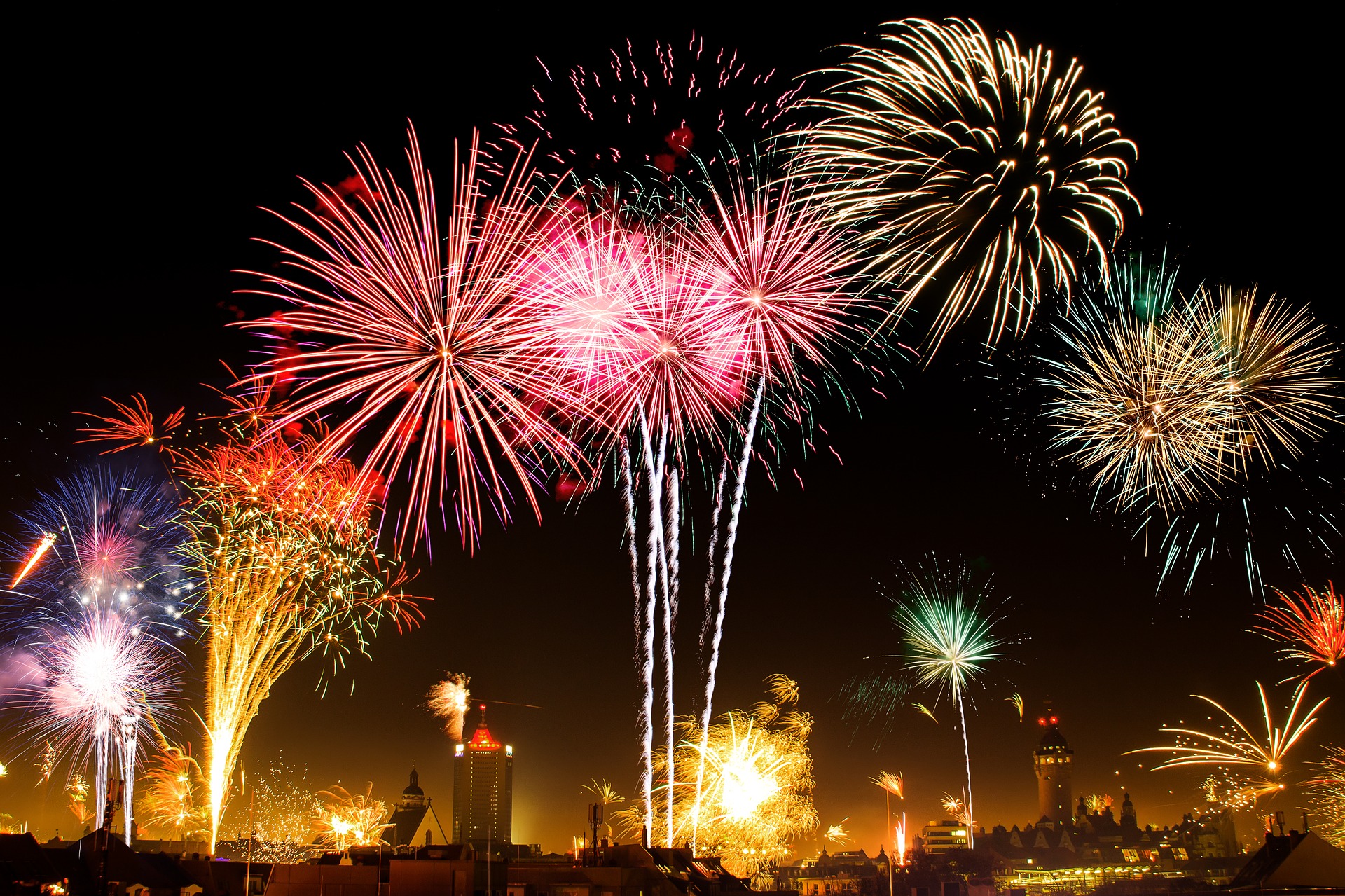 Fireworks over a German city at night HD Wallpaper