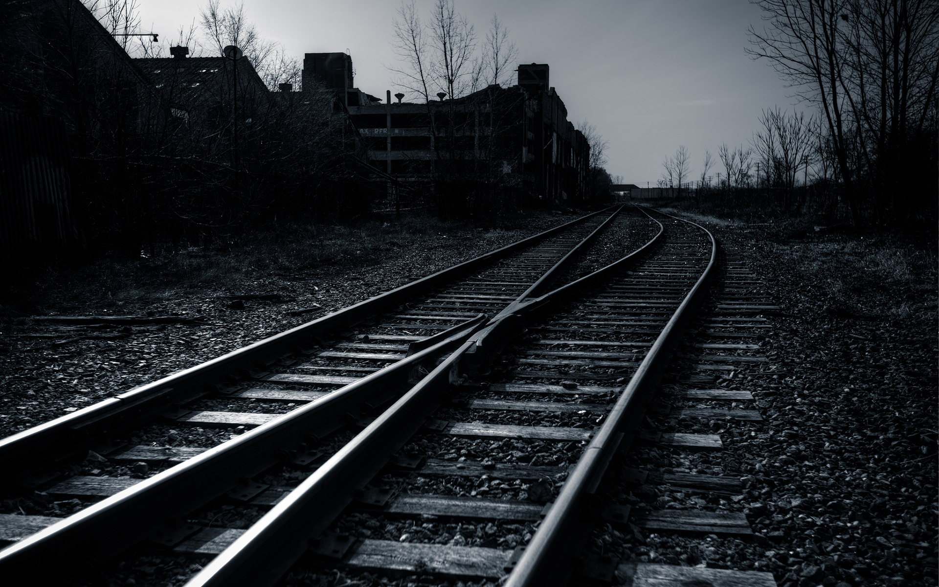 Abandoned Railroad Tracks and Buildings HD Wallpaper