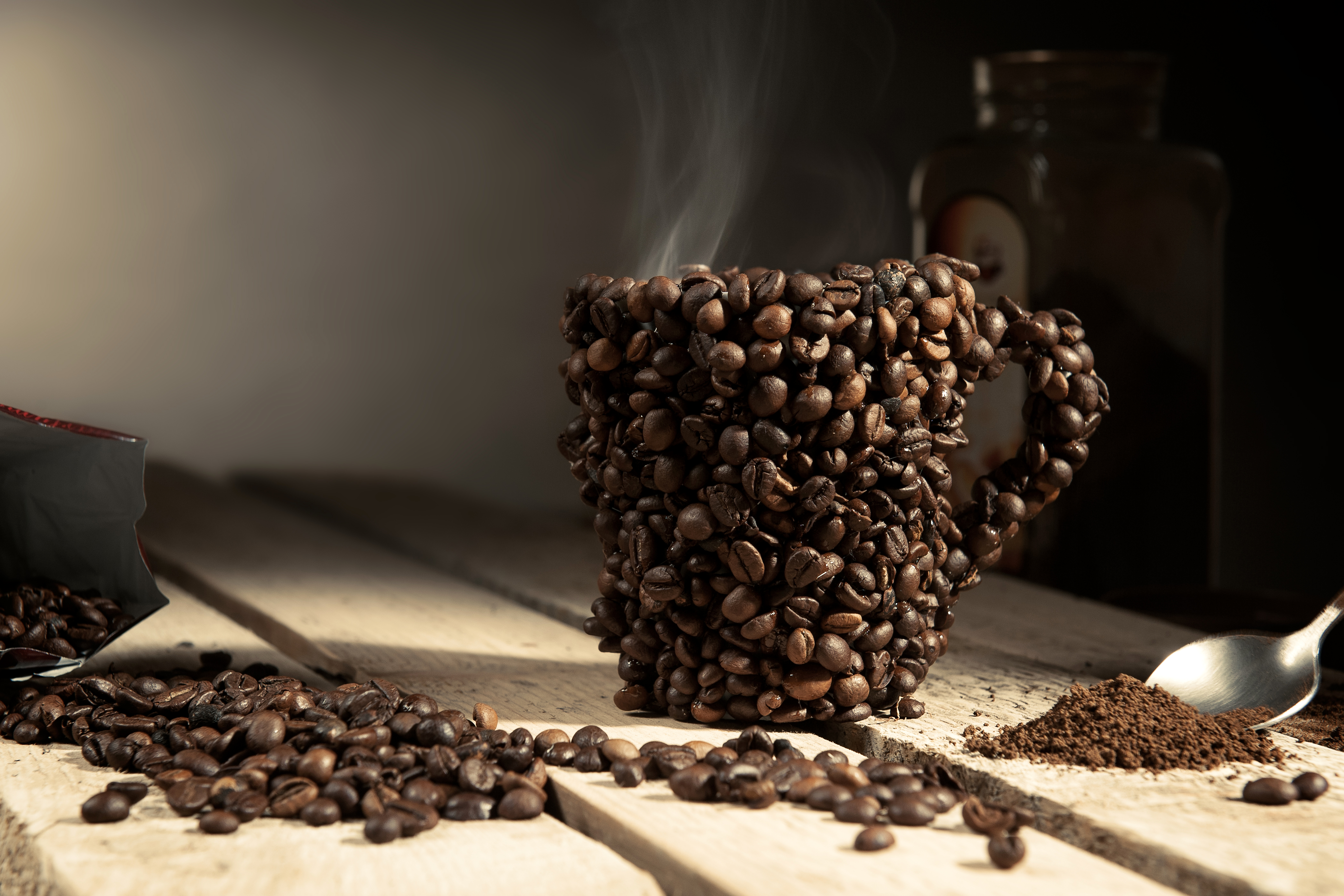 Coffee cup made of coffee beans with steam HD Wallpaper