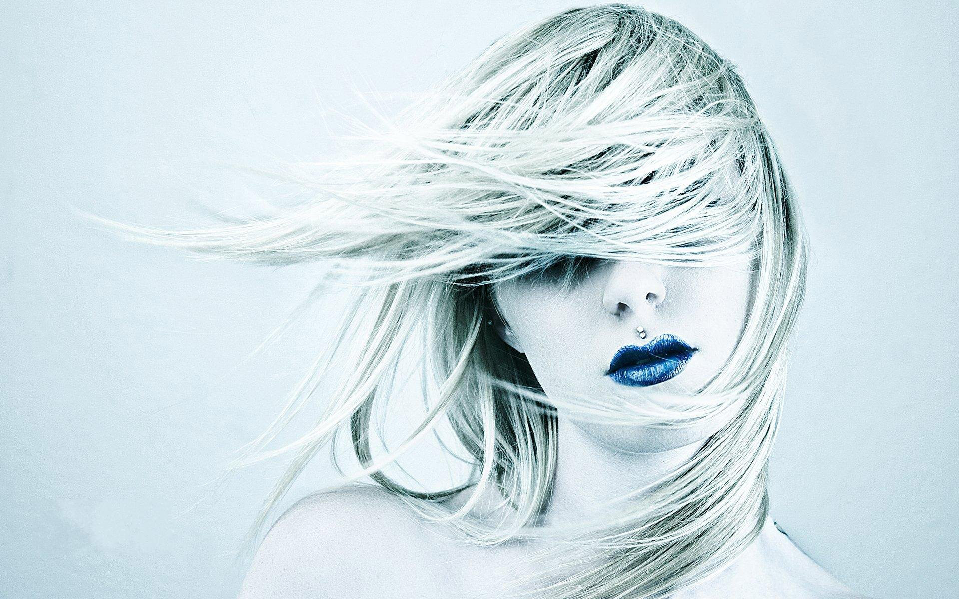 Woman with windblown hair and blue lipstick HD Wallpaper