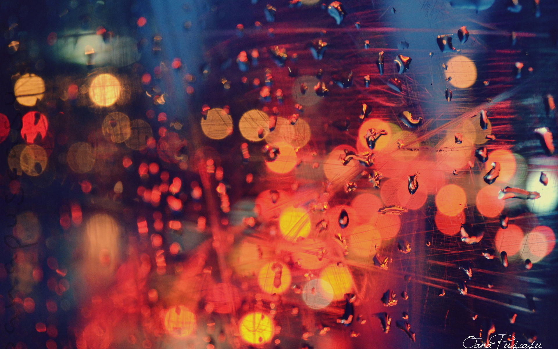 Bokeh lights through raindrops on glass HD Wallpaper