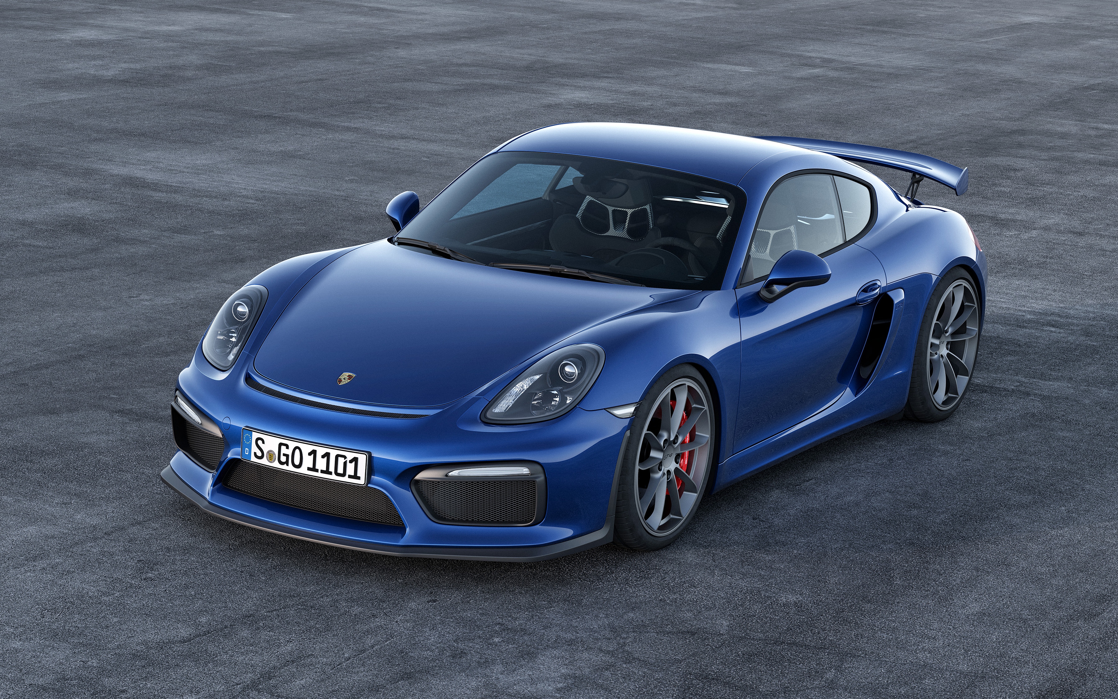 Blue Porsche Cayman GT4 on asphalt HD Wallpaper