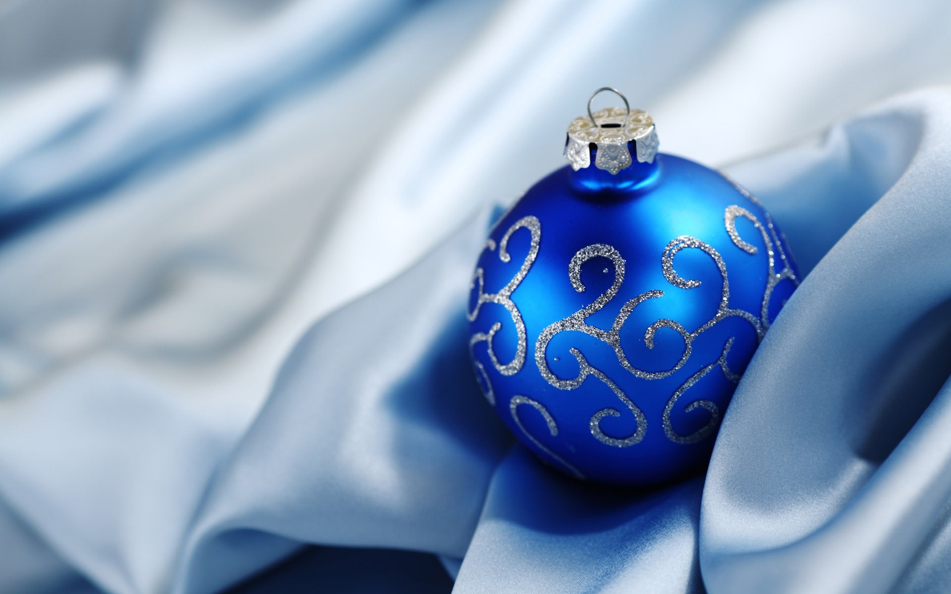 Blue Christmas ornament on blue silk HD Wallpaper