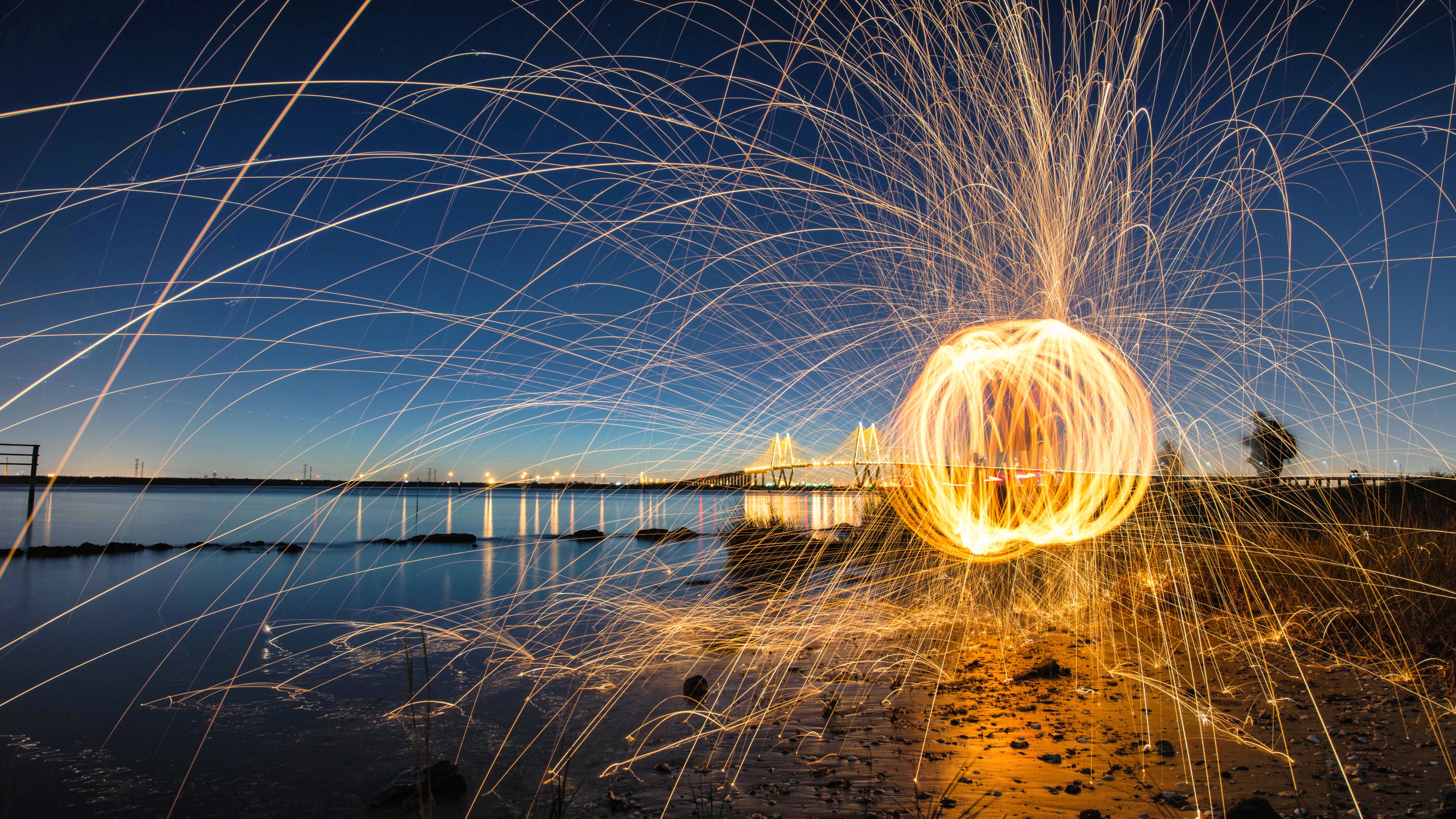 Steel Wool Photography with Bridge at Night HD Wallpaper