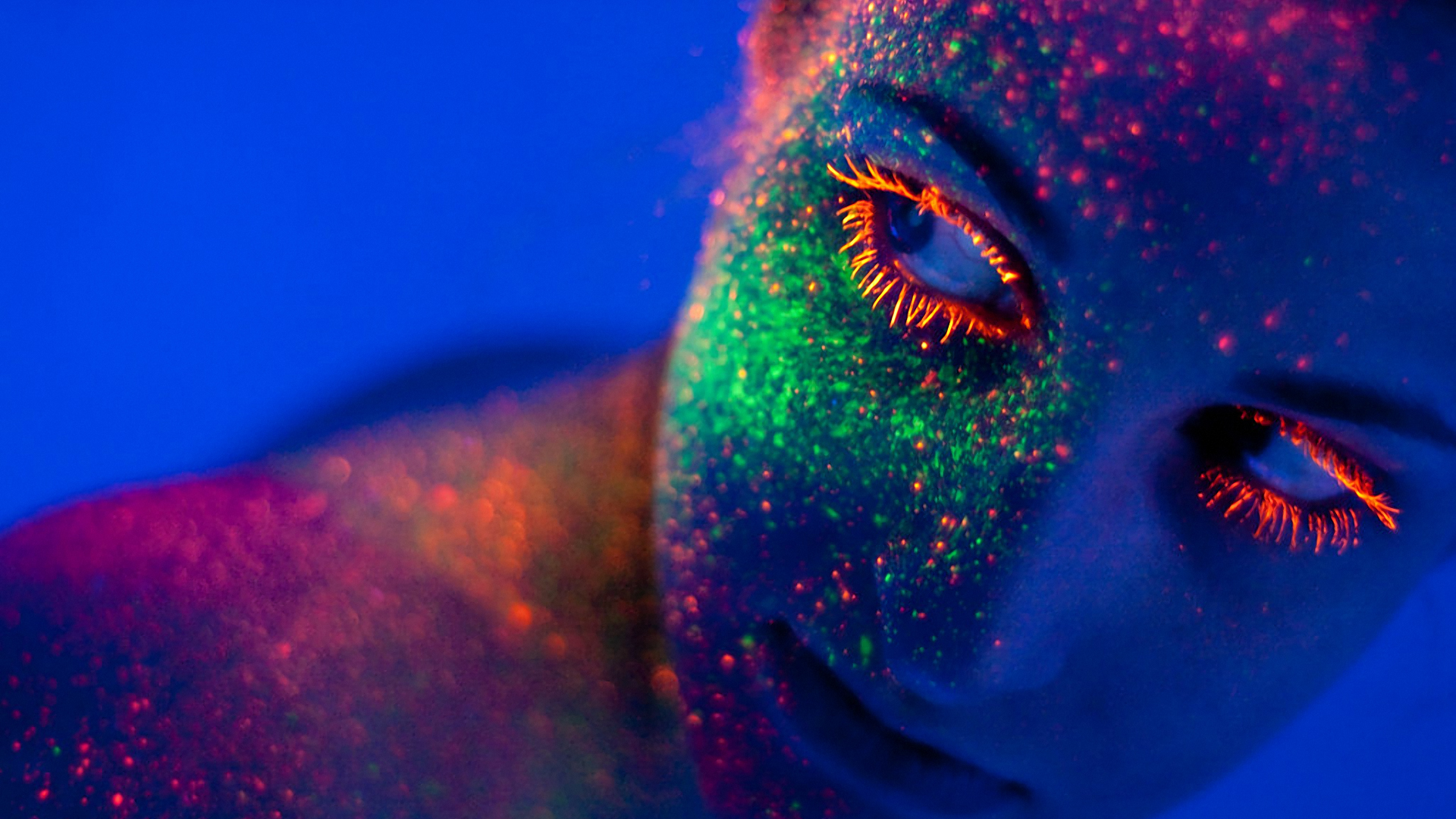 Woman with neon paint under blacklight HD Wallpaper