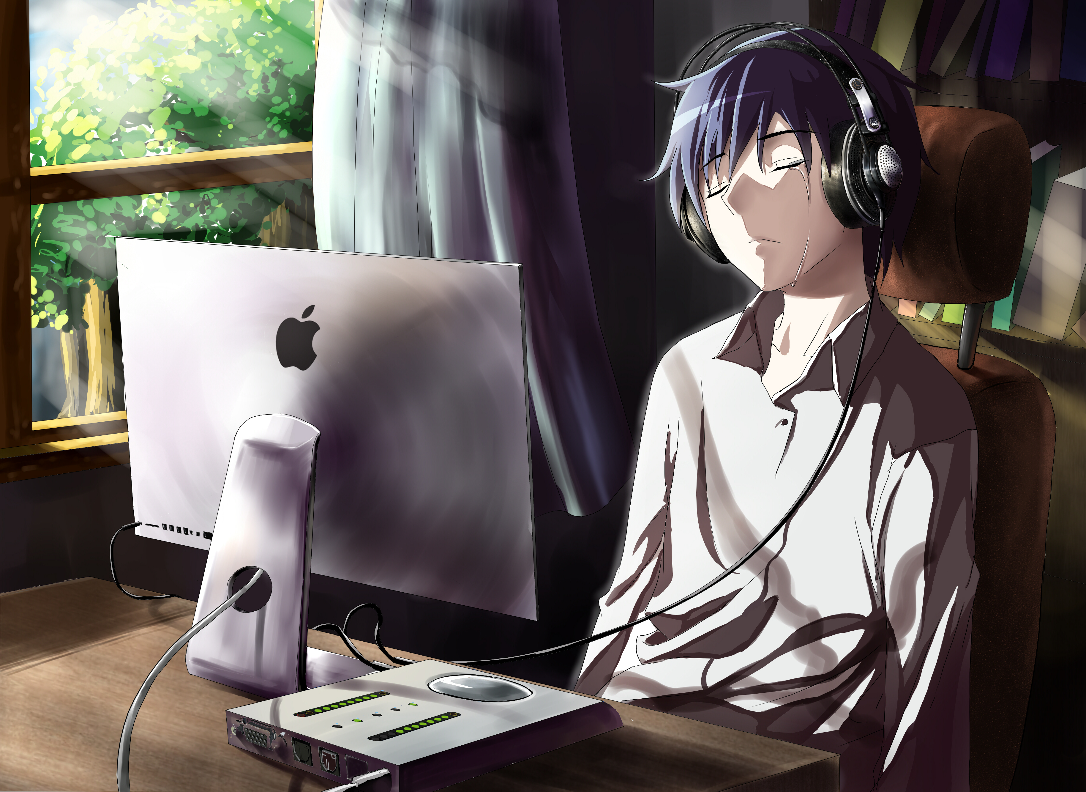 Man wearing headphones and crying in front of Apple computer HD Wallpaper
